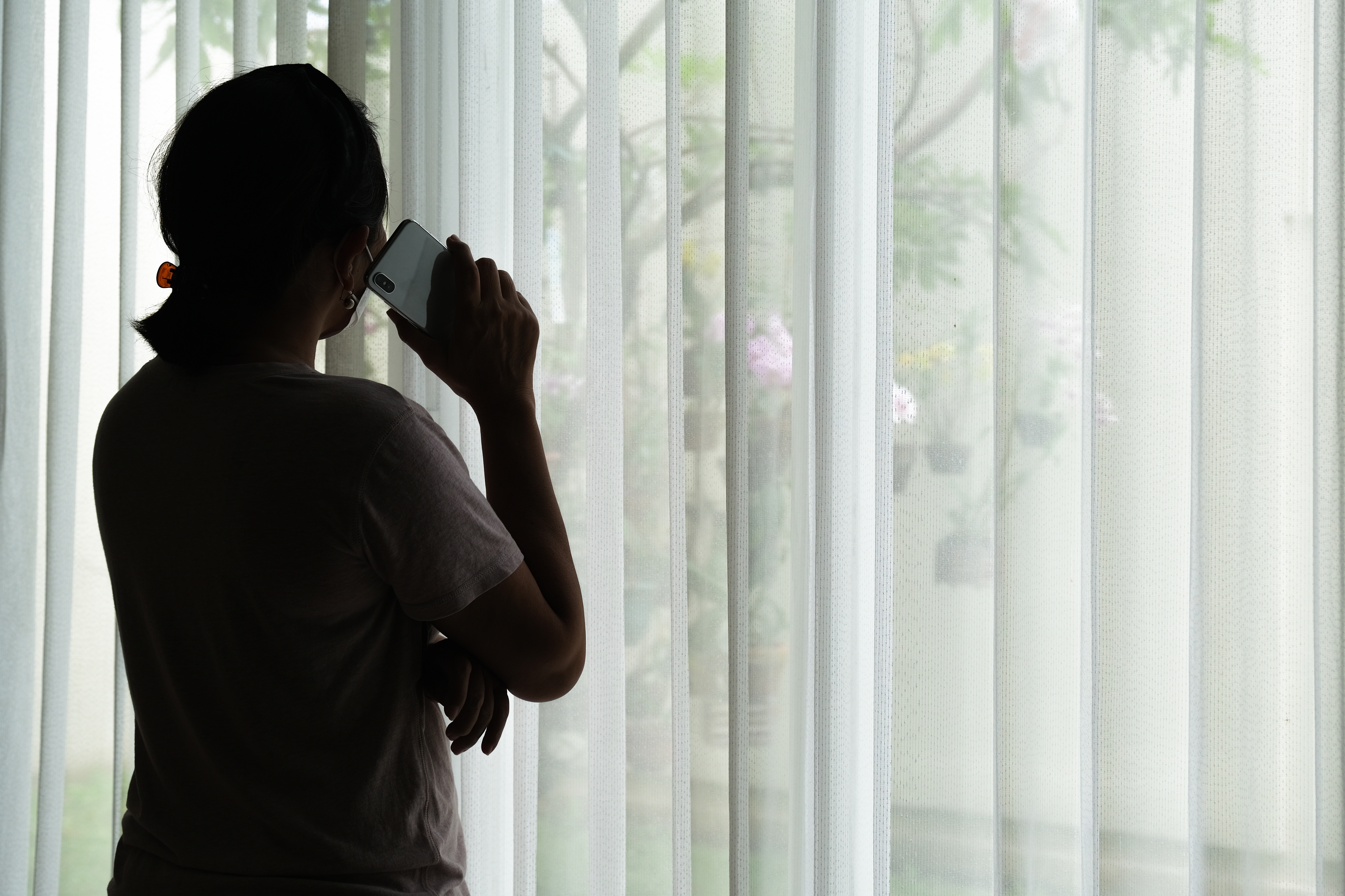A woman attending a call | Source: Shutterstock