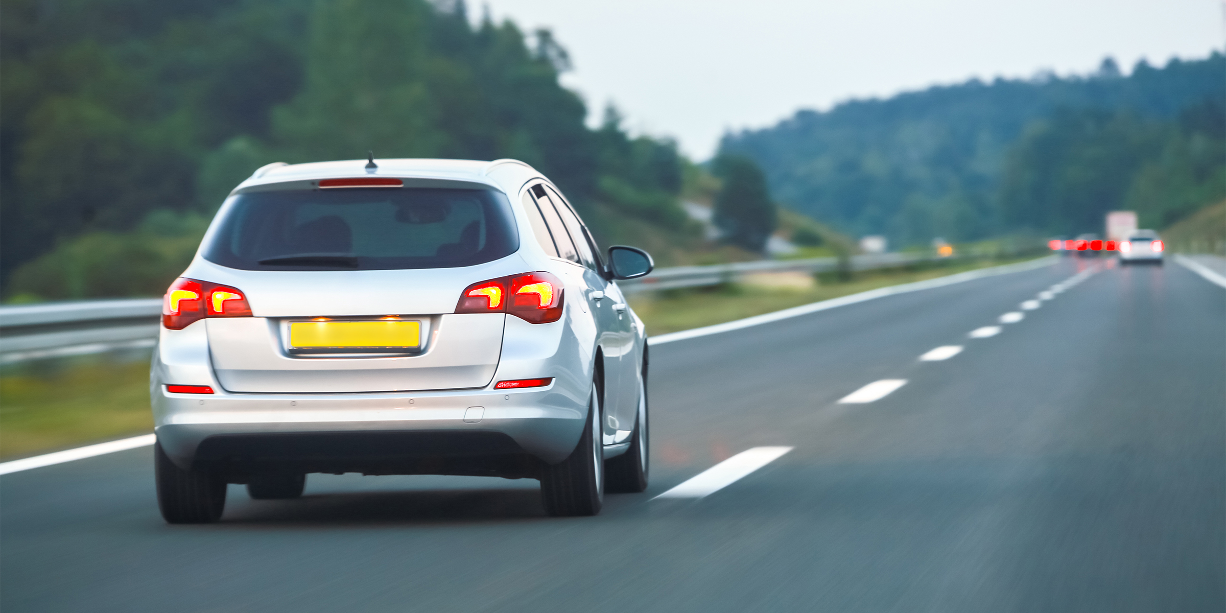 A car driving on a highway | Source: Shutterstock