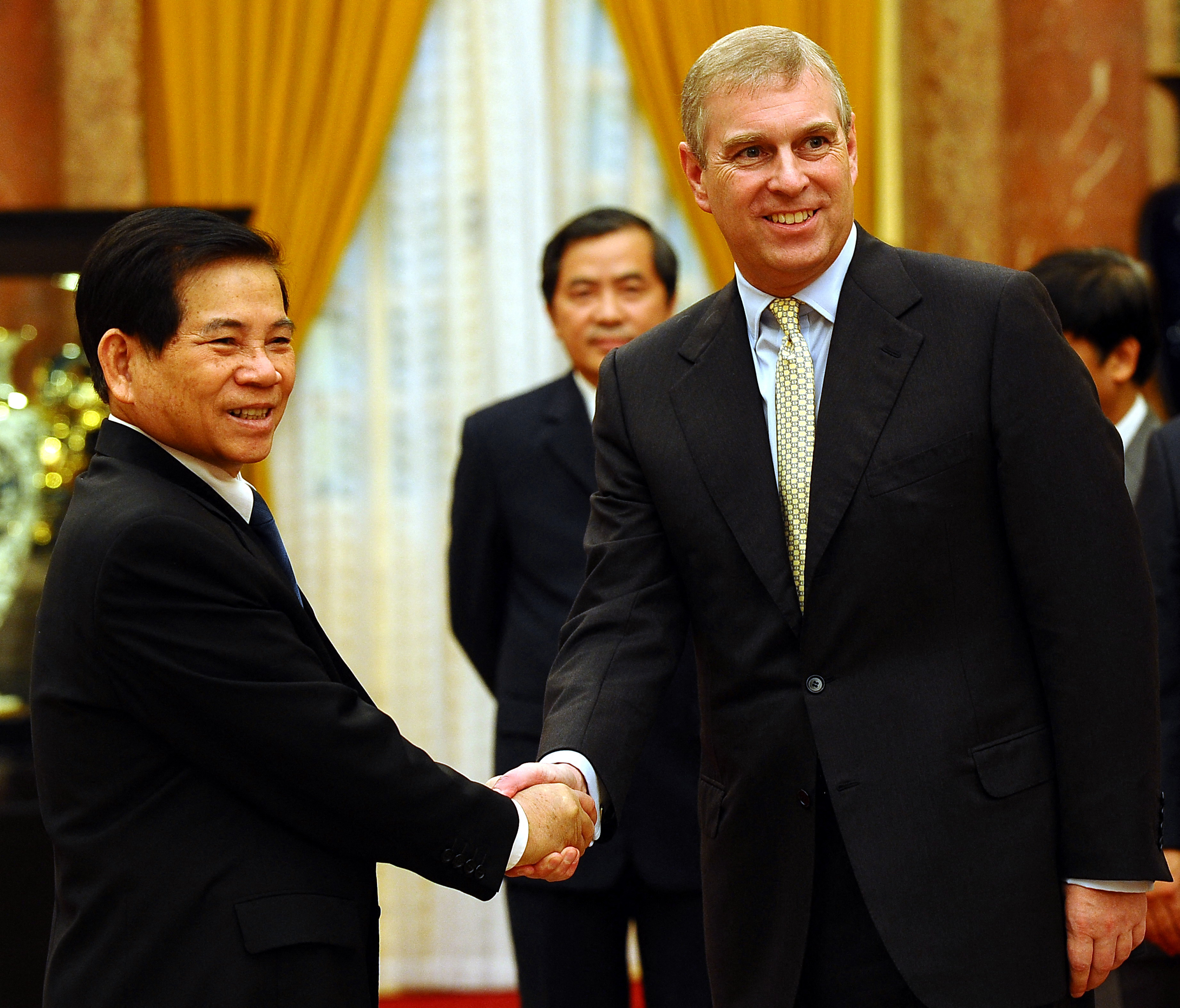 Andrew Mountbatten-Windsor shakes hands with Vietnamese President Nguyen Minh Triet at the presidential palace in Hanoi on 11 October 2010. | Source: Getty Images