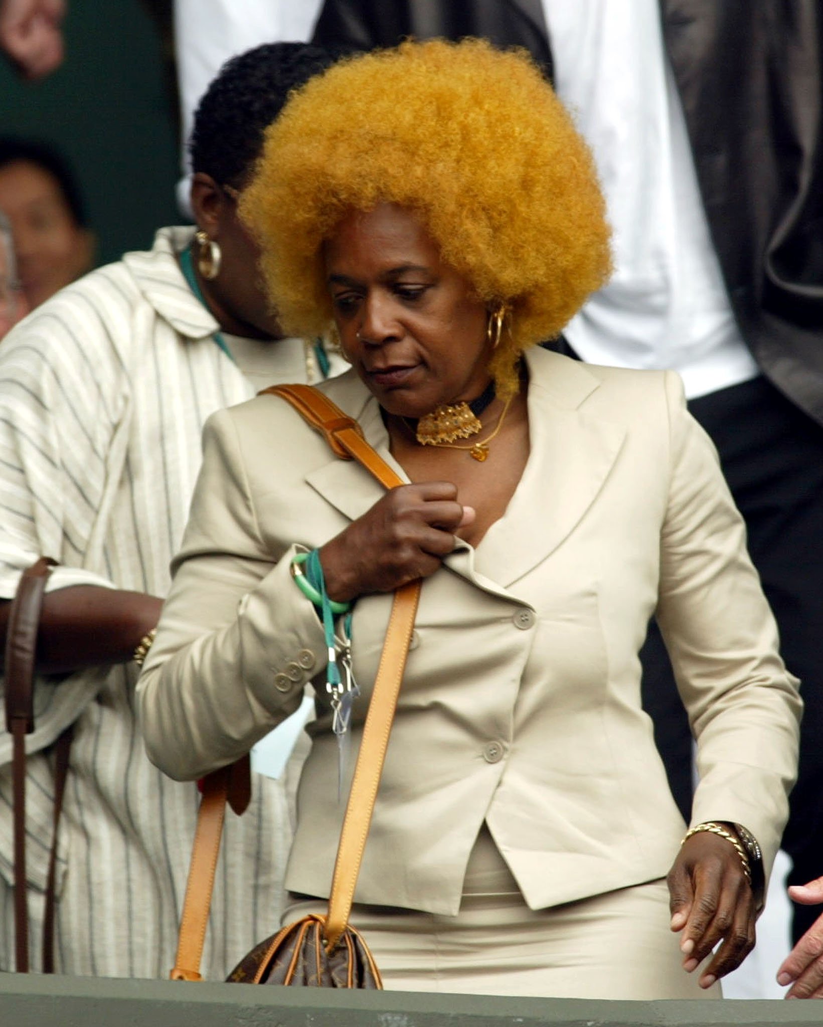  Oracene Williams arrives to her seat at Centre Court to watch her daughters US sister Serena and Venus Williams playing the Women's Final at the Wimbledon Tennis Championships, 06 July 2002. | Source: Getty Images