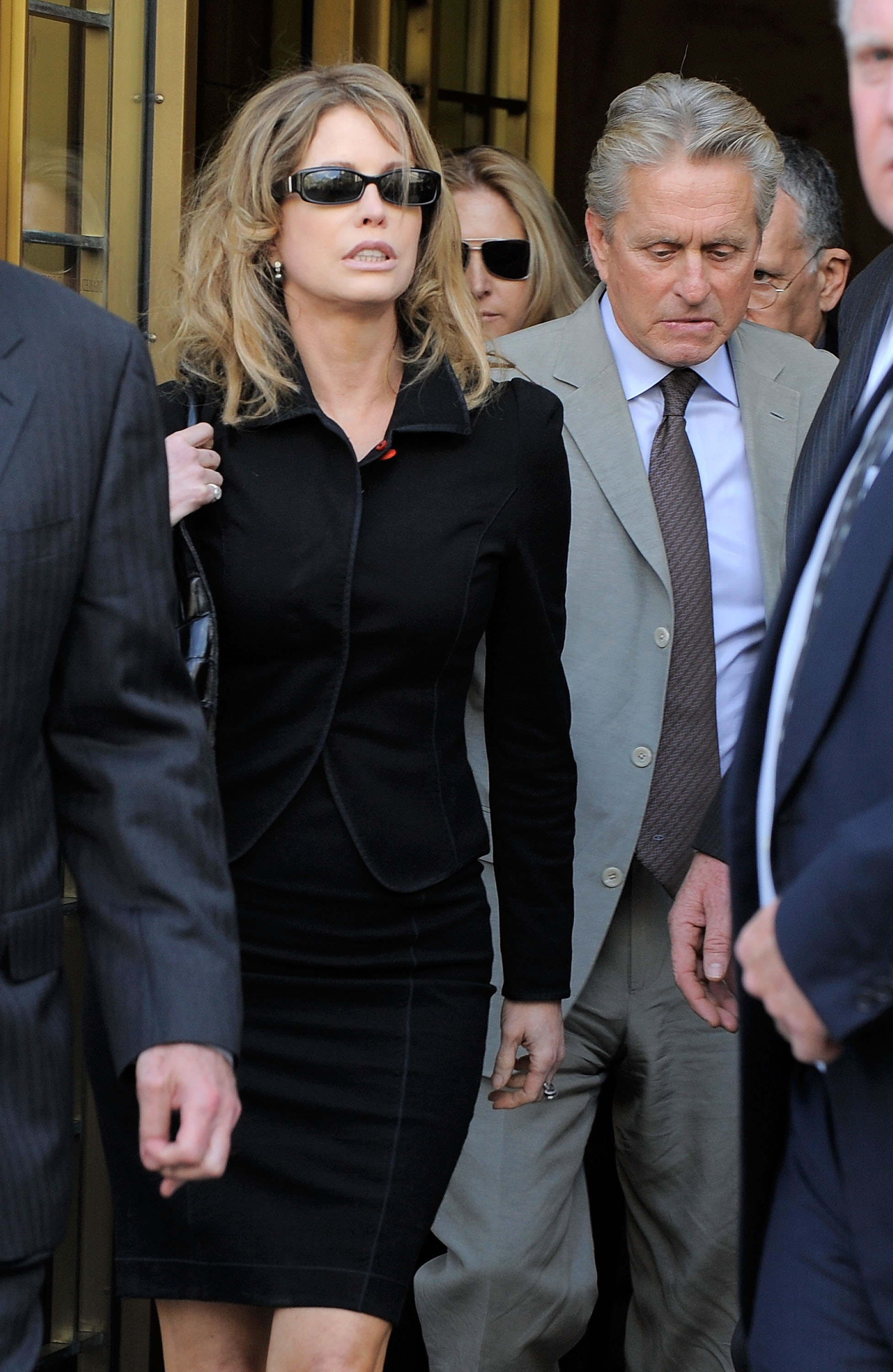 Diandra and Michael Douglas depart the US District Court building following the sentencing of their son Cameron Douglas on April 20, 2010, in New York City.