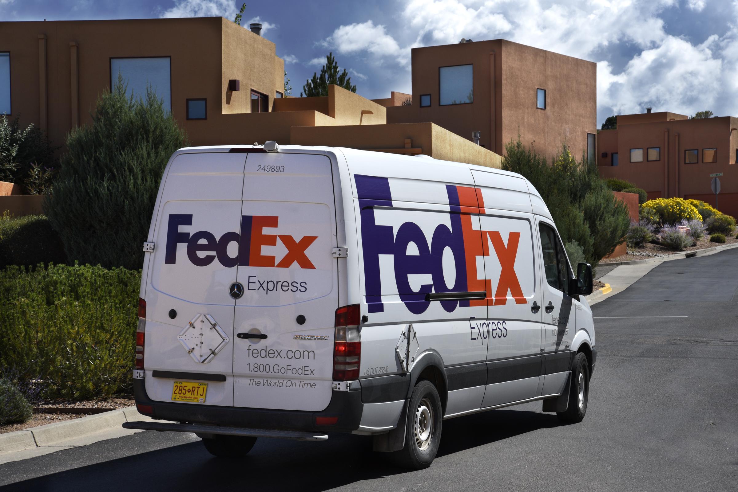 A FedEx van delivers packages in Santa Fe, New Mexico, on September 7, 2018 | Source: Getty Images