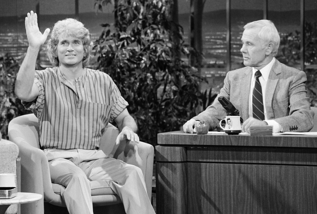 Michael Landon with host Johnny Carson, 1983 | Source: Gary Null/NBC/NBCU Photo Bank via Getty Images