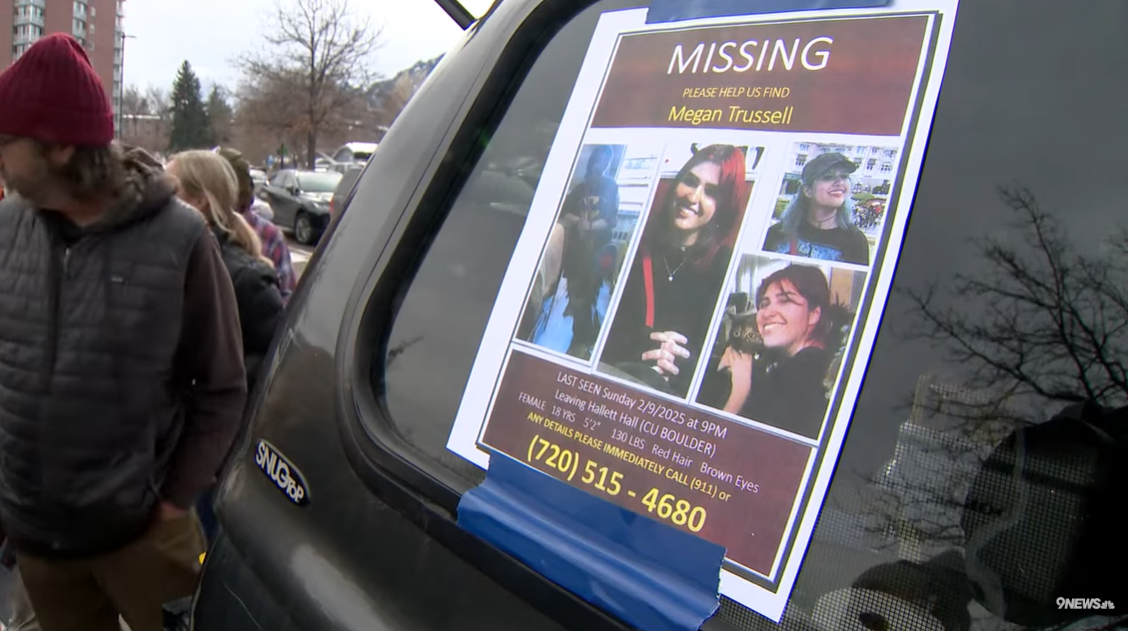 A missing person flyer for Megan Trussell is taped to a vehicle window during a public search, posted on May 28, 2025 | Source: YouTube/9news
