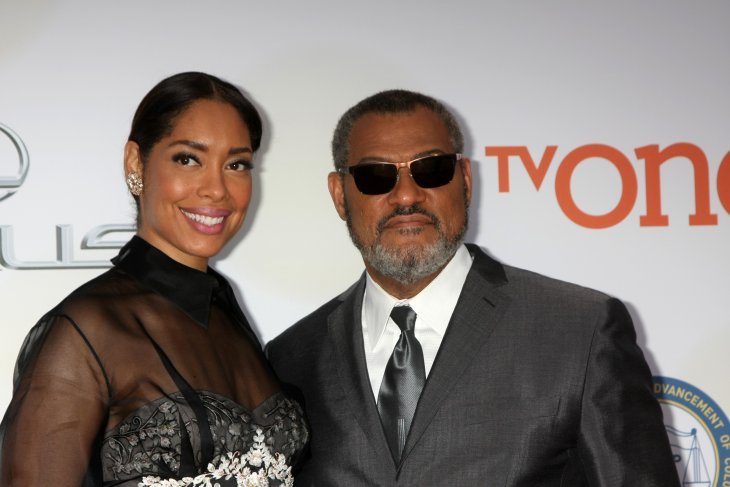 Gina Torres and Laurence Fishburne at the 46th NAACP Image Awards Arrivals at a Pasadena Convention Center on February 6, 2015  | Photo: Getty Images
