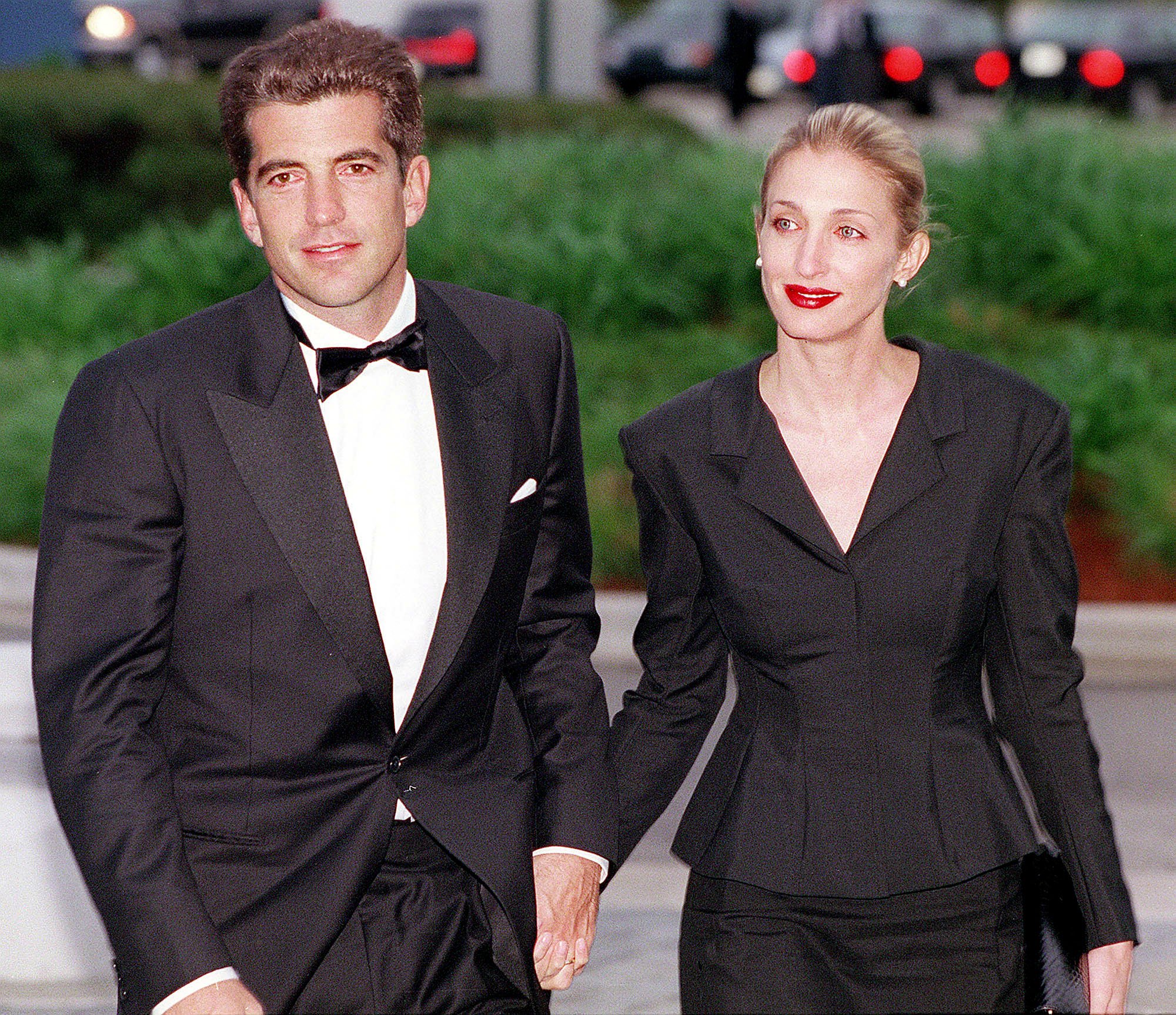 John F. Kennedy, Jr. and his wife Carolyn Bessette Kennedy arrive at the annual John F. Kennedy Library Foundation dinner and Profiles in Courage awards on May 23, 1999, in Boston, MA. | Source: Getty Images.