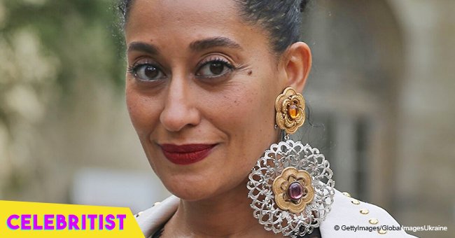 Tracee Ellis Ross steals the show in white gown with deep cleavage at fashion show in Paris