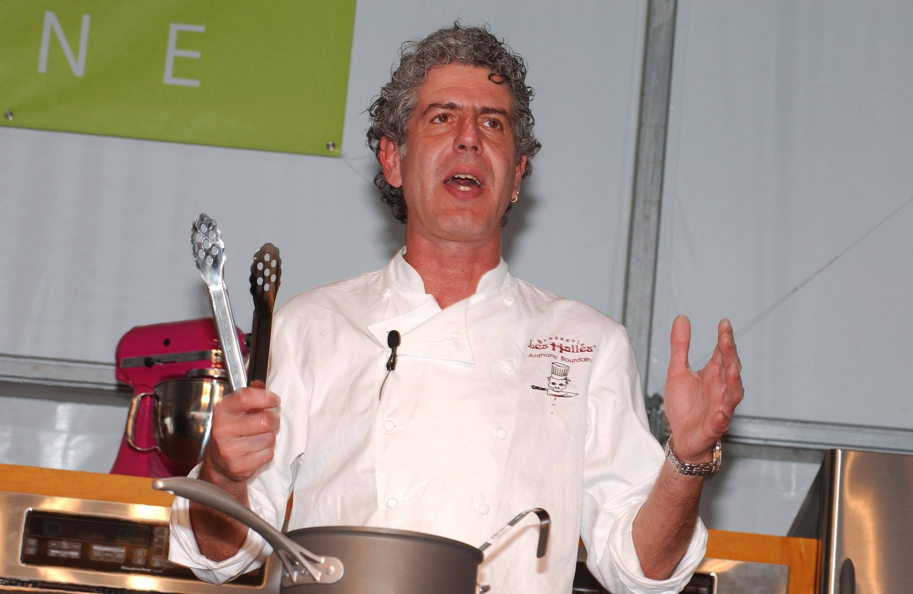 Chef Anthony Bourdain does a cooking demonstration at the South Beach Food And Wine Festival on February 26, 2005, in Miami Beach, Florida. | Source: Getty Images