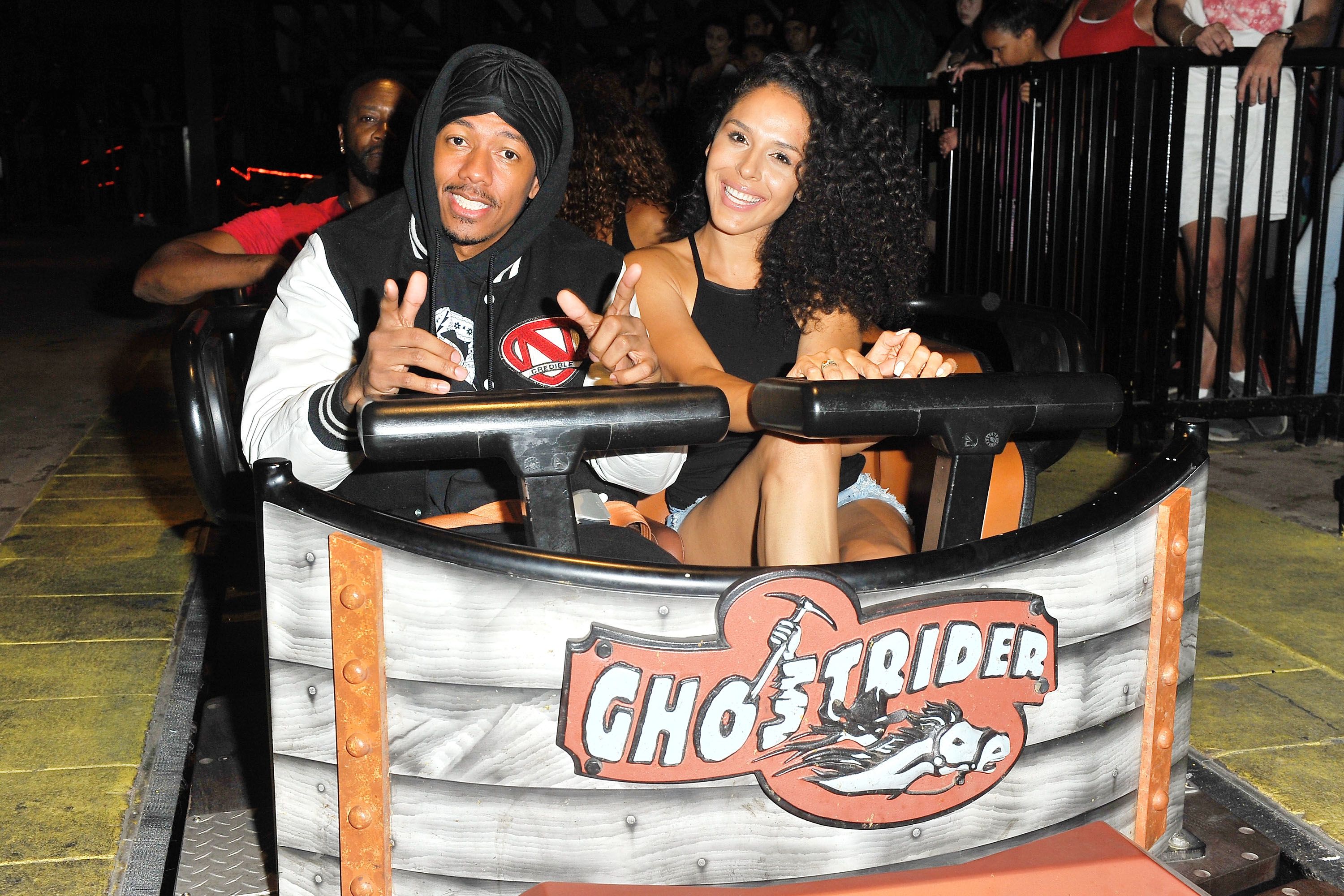 Nick Cannon and Brittany Bell at the "Ghostrider" Roller Coaster at Knott's Berry Farm on September 1, 2017 in Buena Park, California. | Source: Getty Images