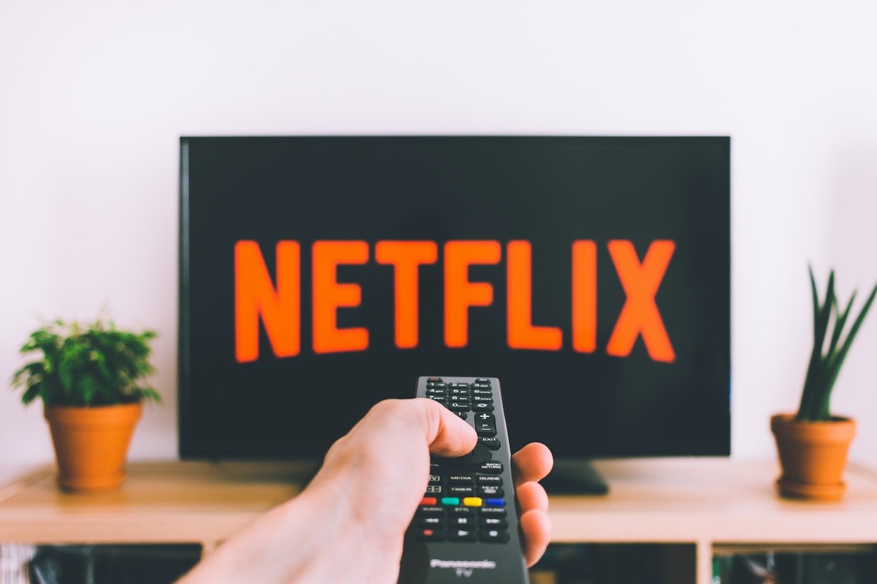 Person watching Netflix on TV| Photo by freestocks.org from Pexels