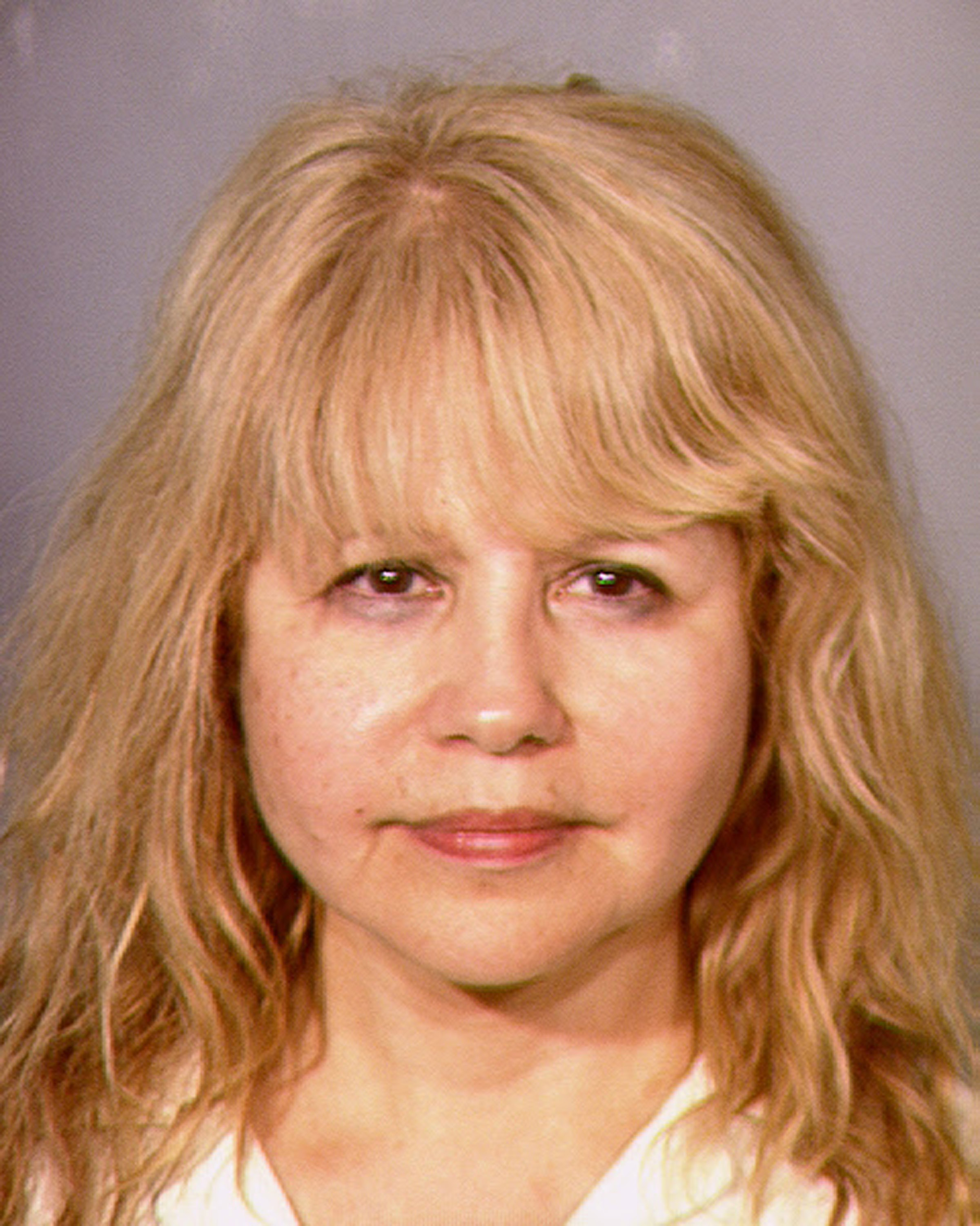 The famous actress's mugshot after being booked into the Clark County Detention Center for domestic battery and misdemeanor coercion in 2013. | Source: Getty Images