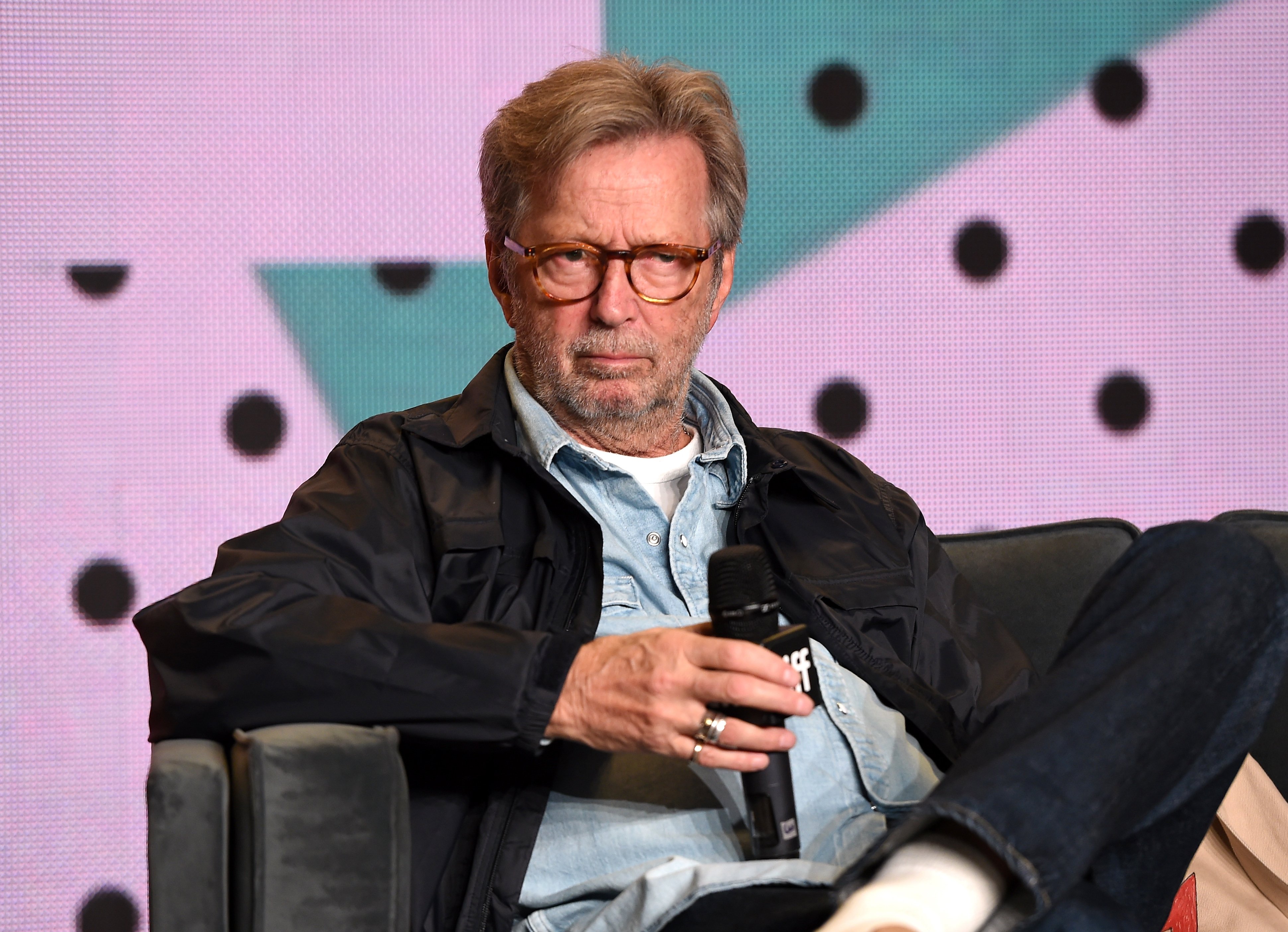 Eric Clapton speaks onstage at "Eric Clapton: Life In 12 Bars" press conference during 2017 Toronto International Film Festival. | Source: Getty Images