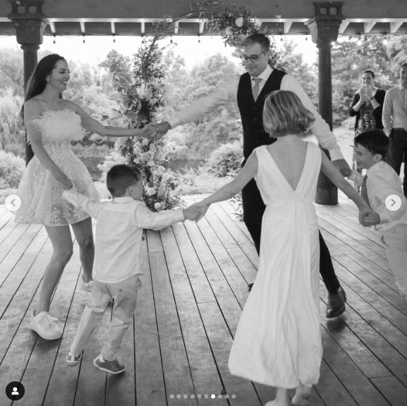 Eva Amurri, Ian Hock, Marlowe, Major and Mateo Martino having fun at the wedding reception, posted on July 2, 2024 | Source: Instagram/thehappilyeva