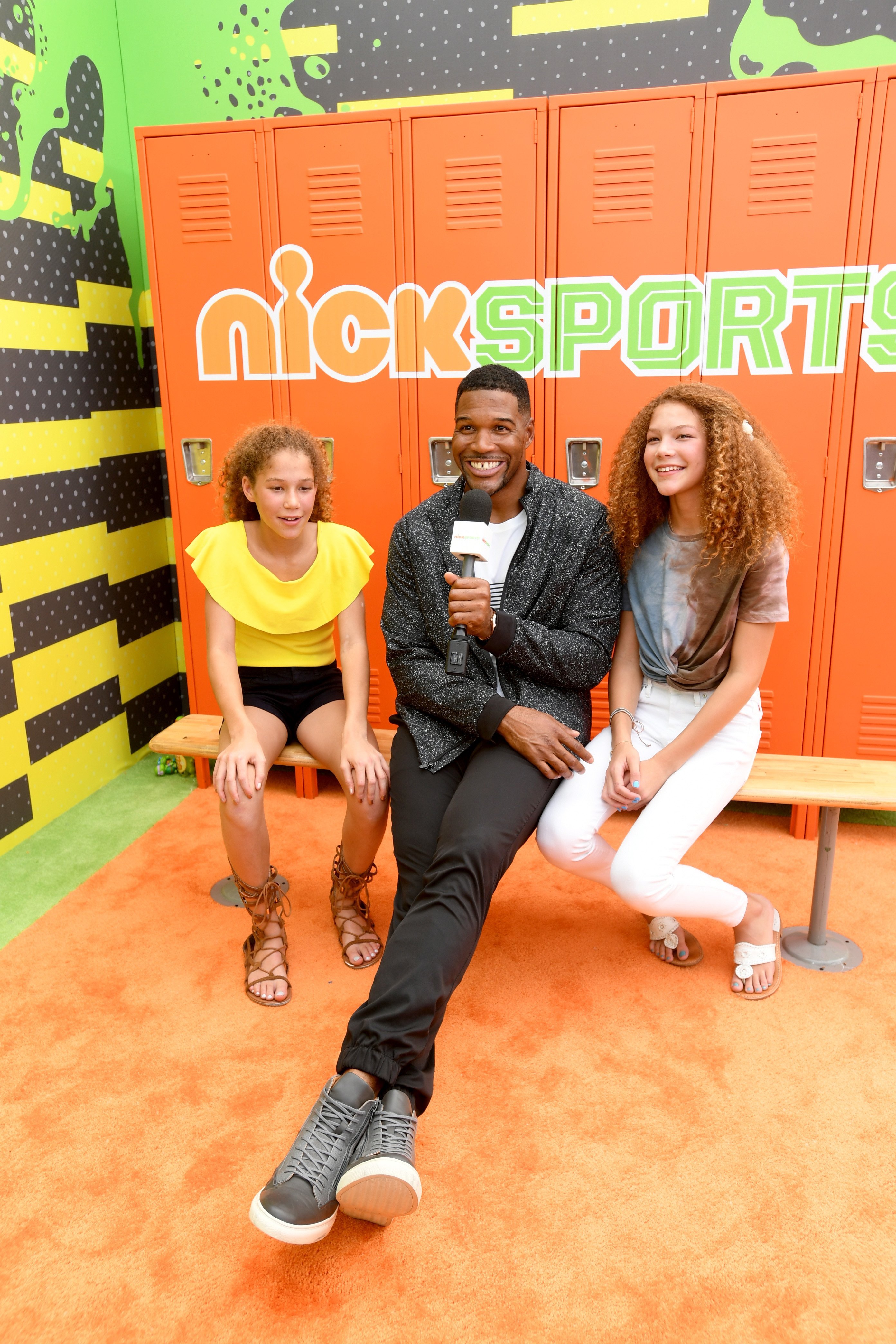  Michael Strahan and his twin daughters, Sophia and Isabella. | Source: Getty Images