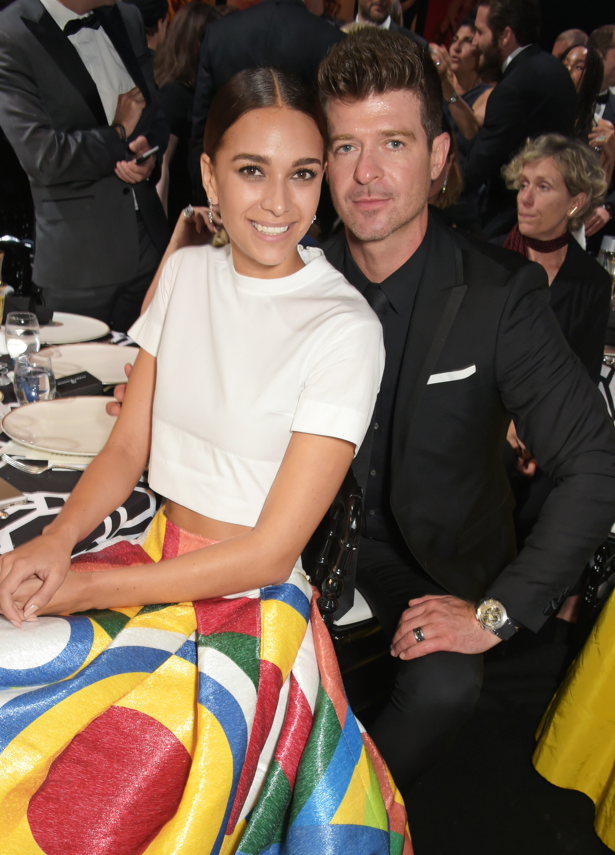 April Love Geary (L) and singer Robin Thicke attend amfAR's 22nd Cinema Against AIDS Gala, Presented By Bold Films And Harry Winston at Hotel du Cap-Eden-Roc on May 21, 2015, in Cap d'Antibes, France. | Source: Getty Images