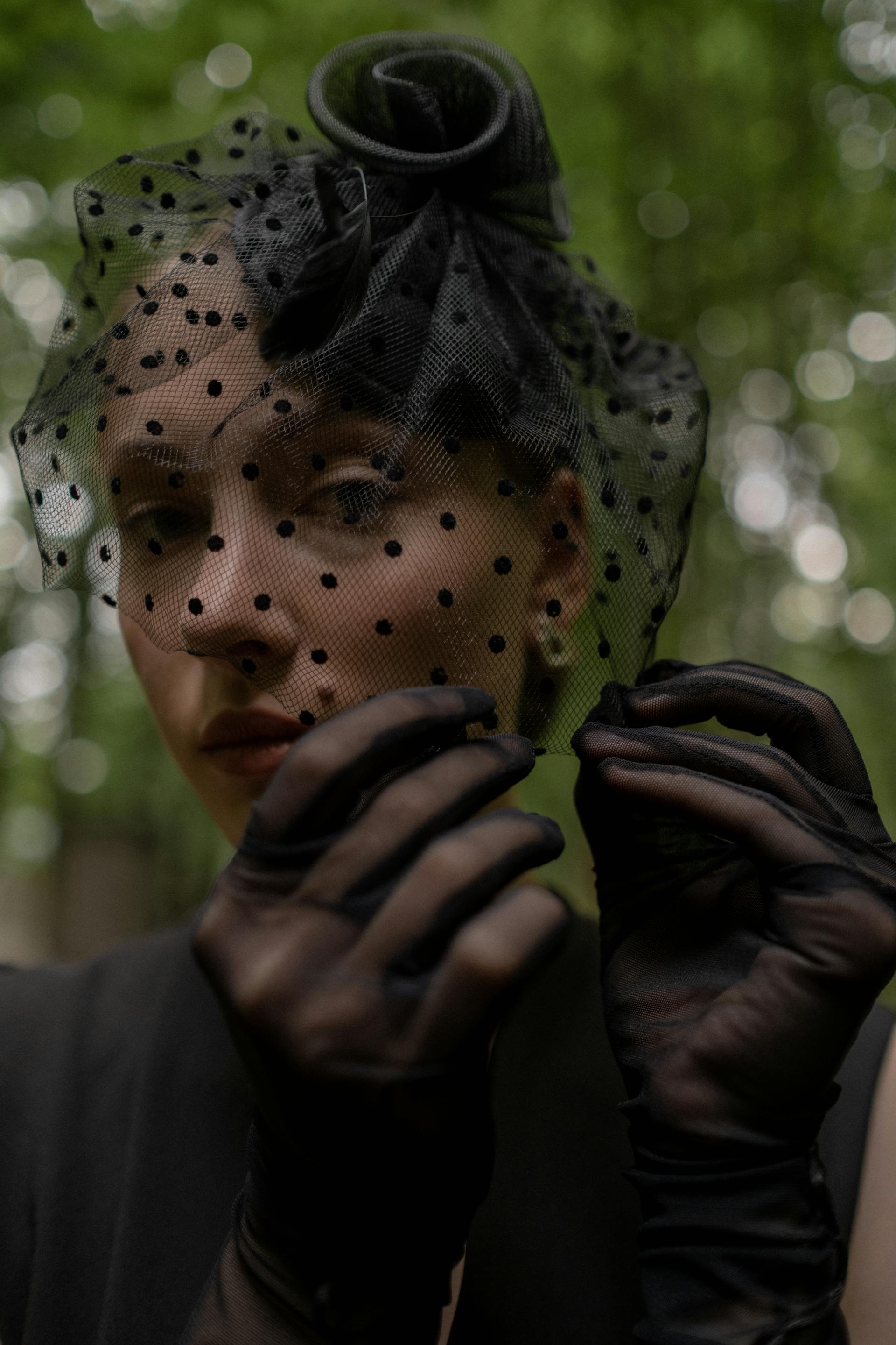 A person wearing a black veil | Source: Pexels