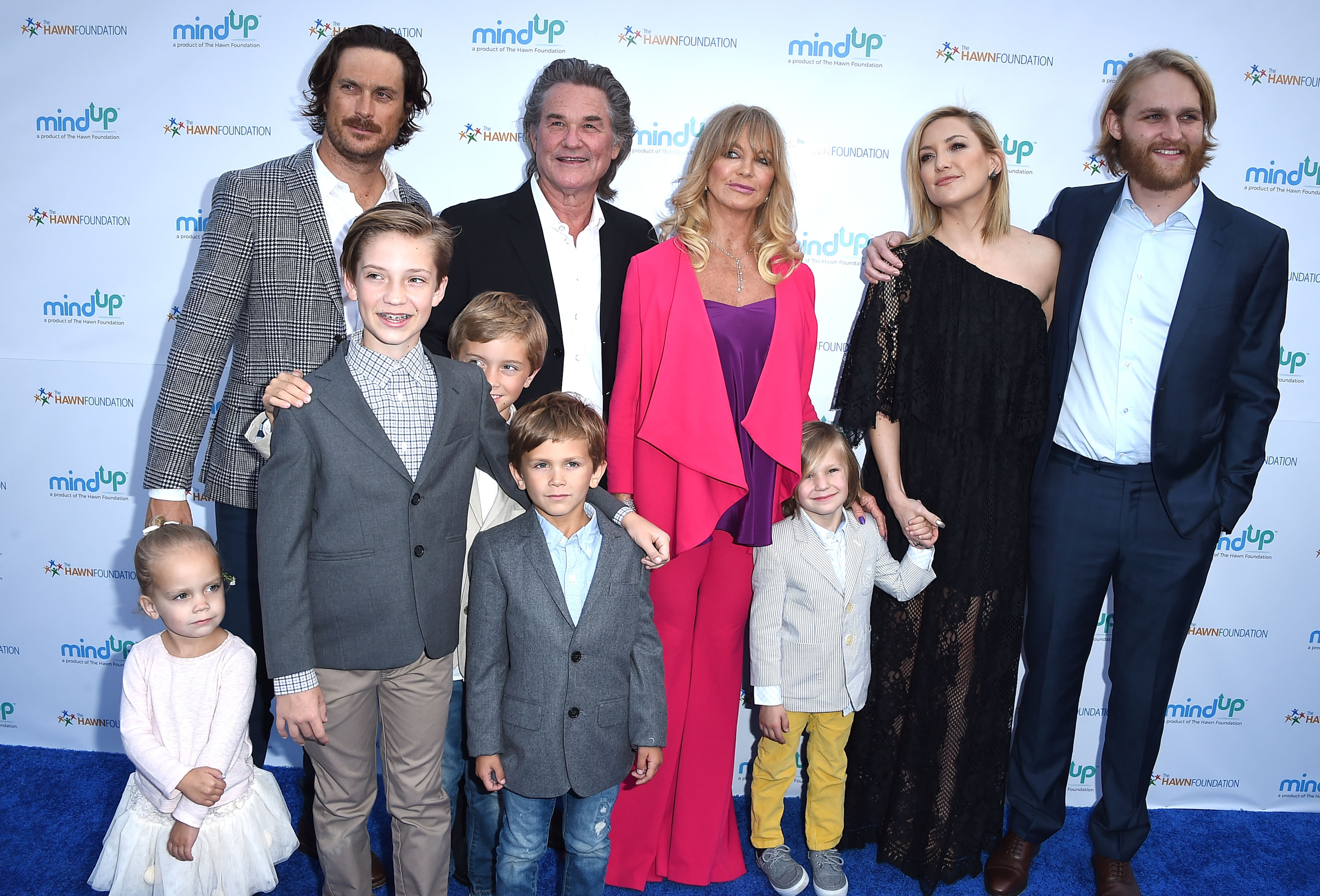 Oliver Hudson, Kurt Russell, Goldie Hawn, Kate Hudson and Wyatt Russell during the Goldie Hawn Hosts Annual Goldie's Love In For Kids at Ron Burkle's Green Acres Estate on May 6, 2016, in Beverly Hills, California. | Source: Getty Images