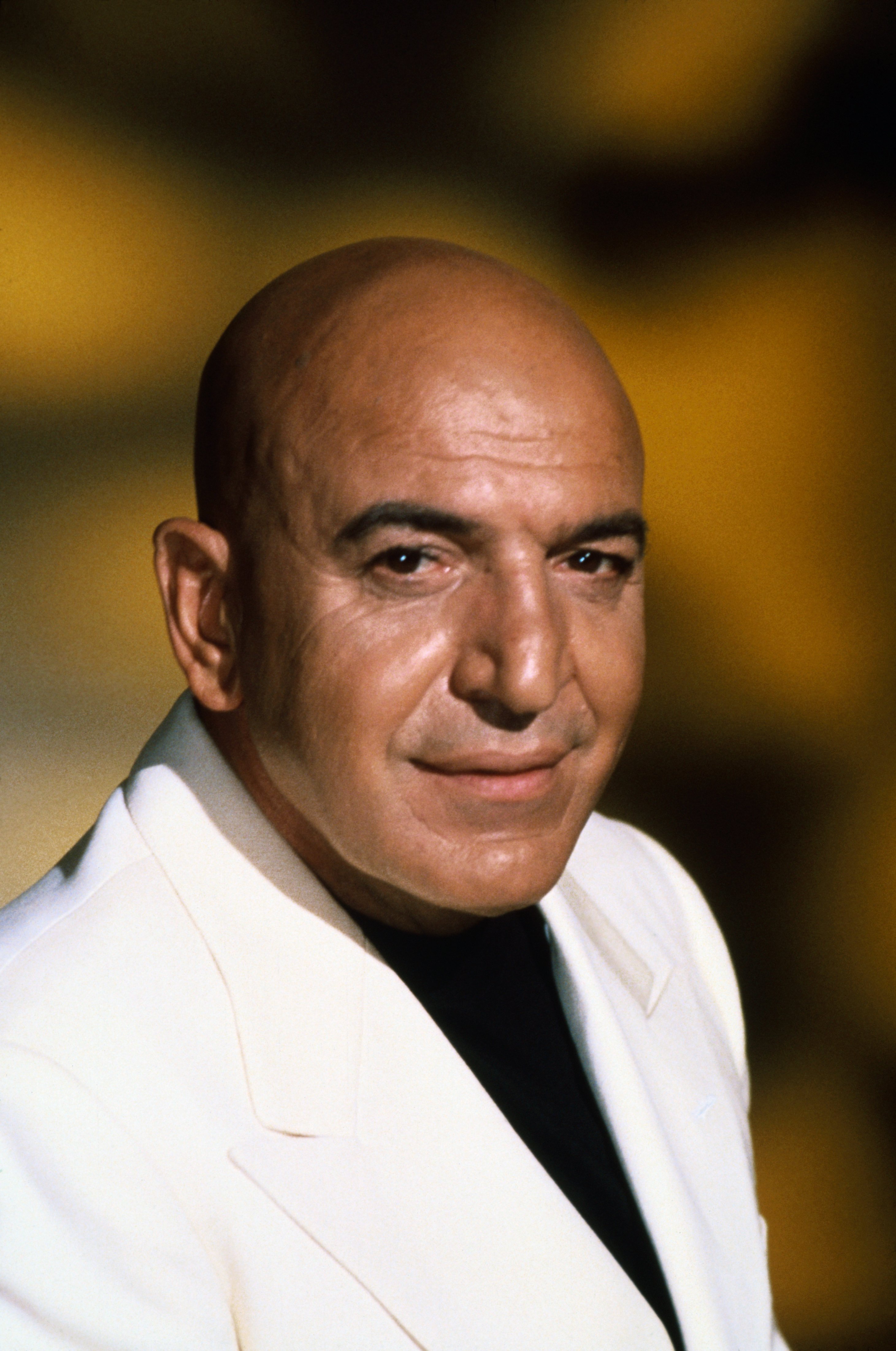 Closeup of actor Telly Savalas. | Source: Getty Images