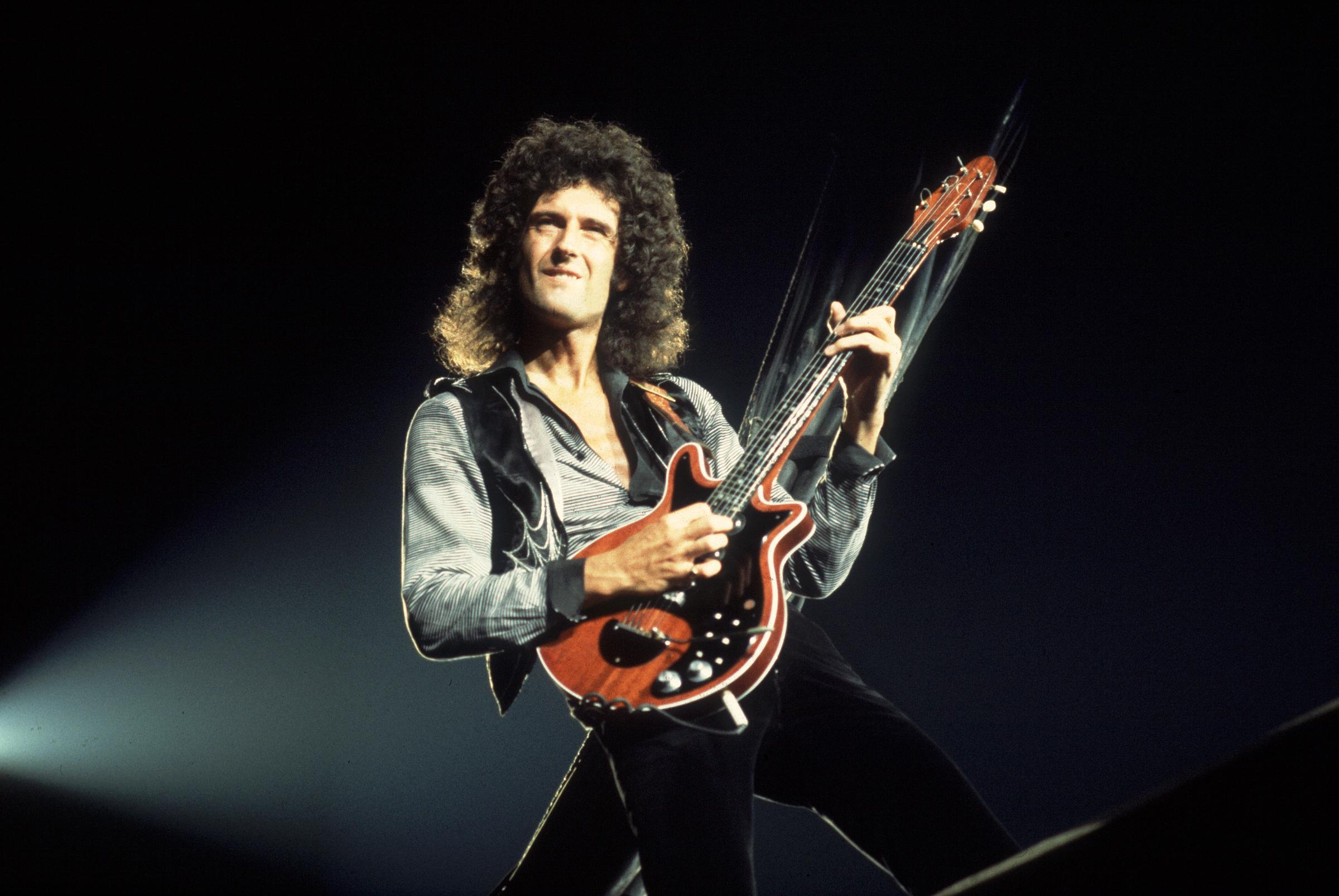 Brian May of Queen performs on stage in Rosemont, Illinois, on September 19, 1980. | Source: Getty Images