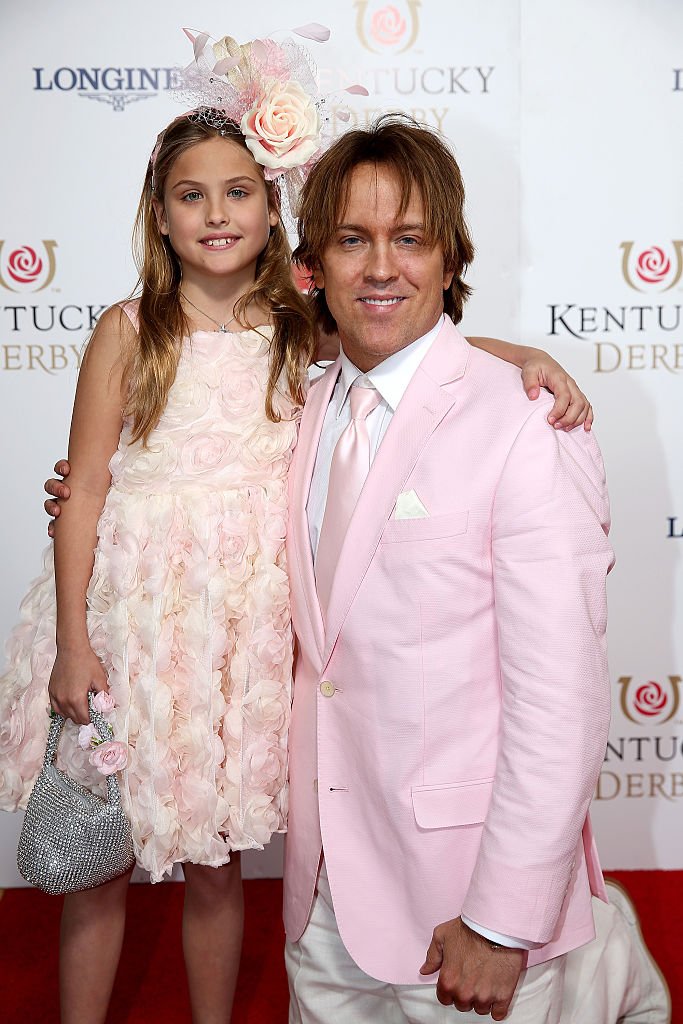Anna Nicole Smith's daughter Dannielynn with her father Larry Birkhead at Churchill Downs on May 2 2015 in Louisville Kentucky | Source: Getty Images