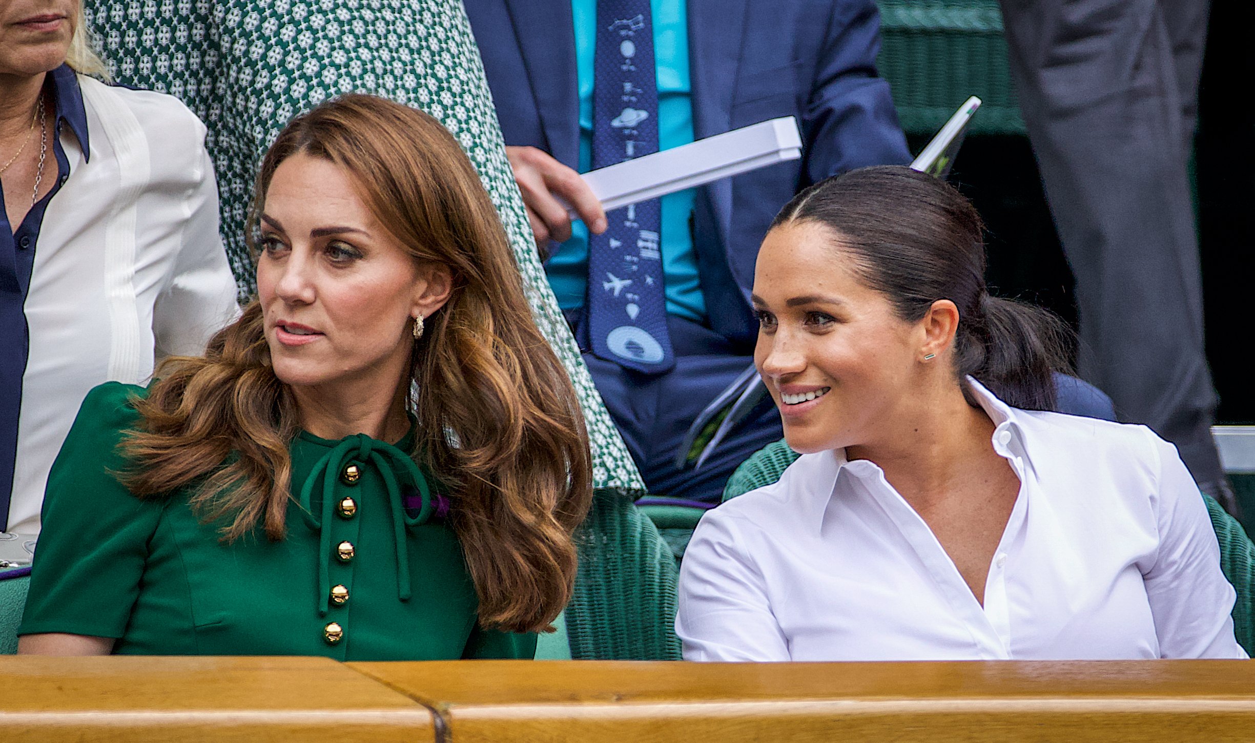 Duchess Kate and Duchess Meghan in the Royal Box on Centre Court ahead of the Ladies Singles Final during the Wimbledon Lawn Tennis Championships on July 13, 2019, in London, England. | Source: Getty Images