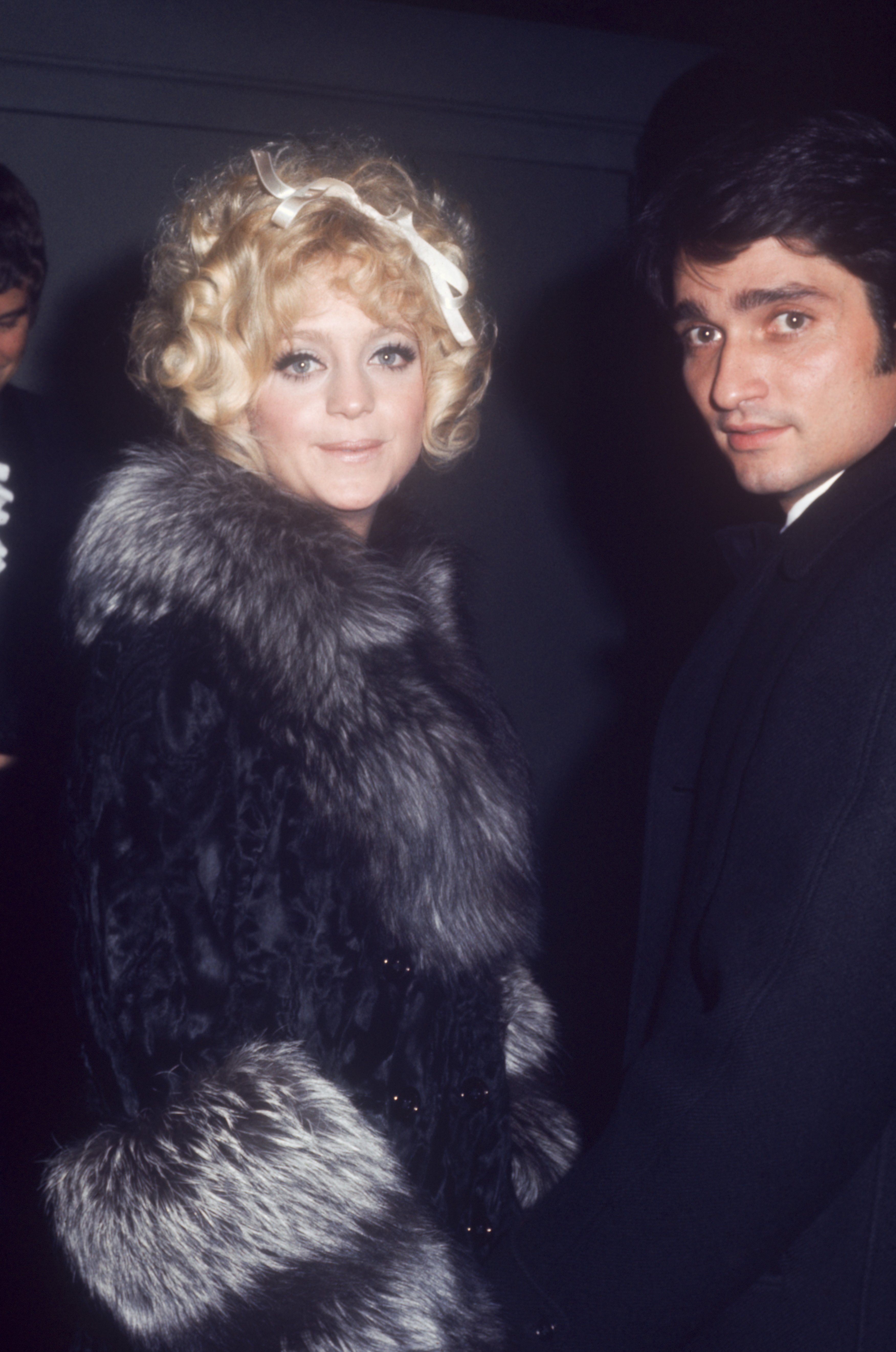 Gus Trikonis with Goldie Hawn; she is wearing a fur coat; circa 1970; New York | Source: Getty Images 