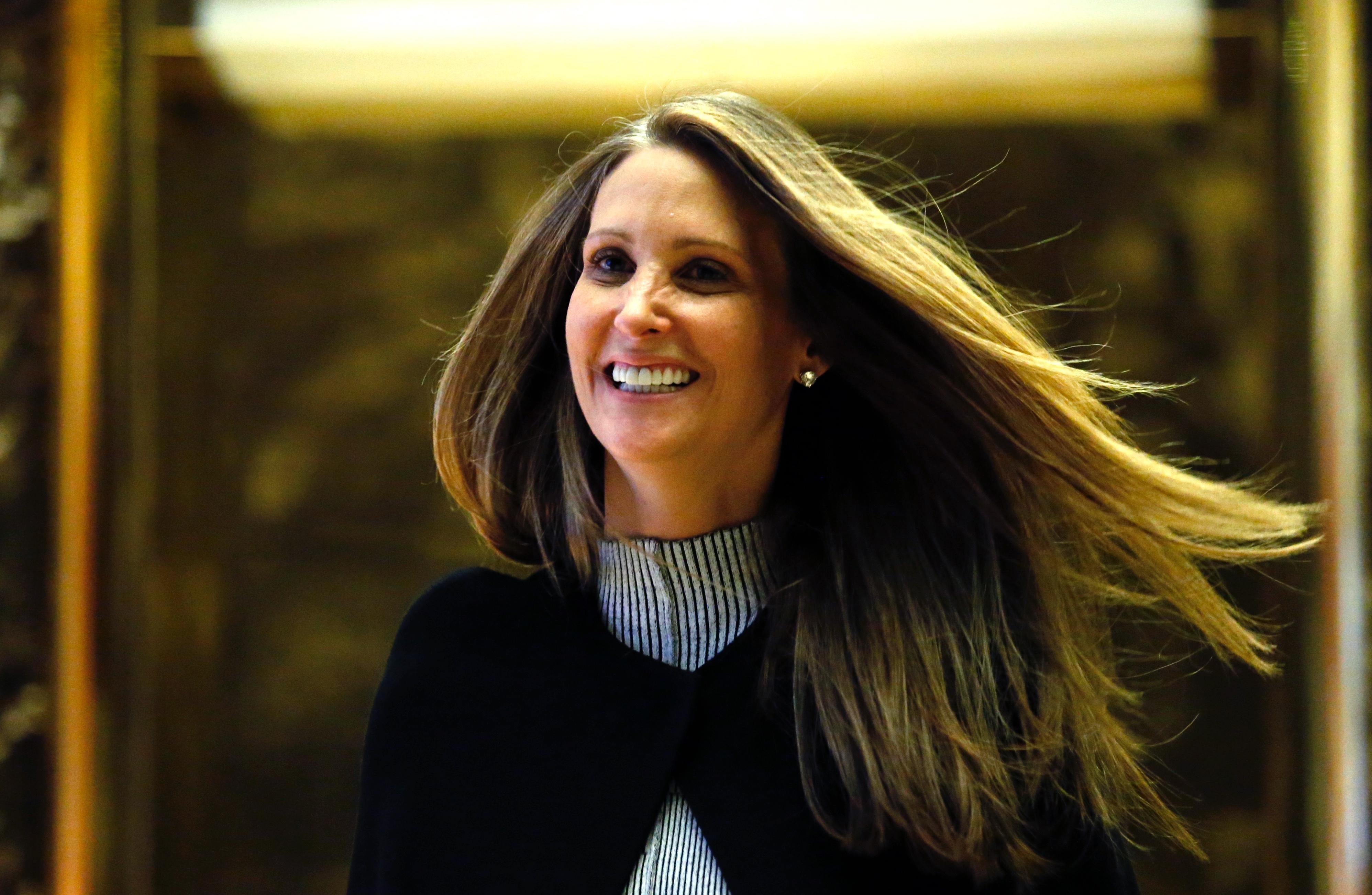 Stephanie Winston Wolkoff poses for photos at Trump Tower in New York City on December 5, 2016 | Source: Getty Images
