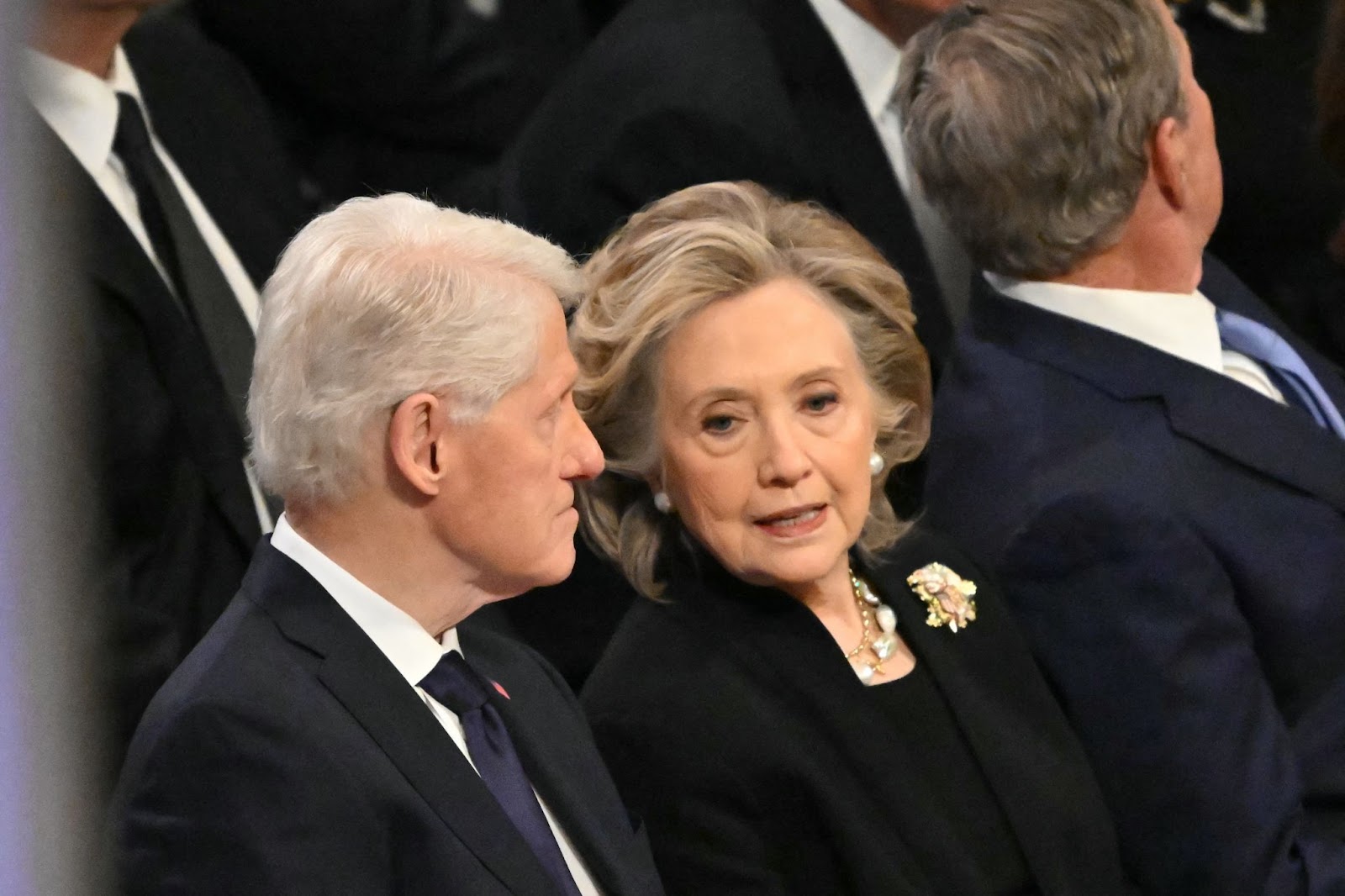 Former U.S. President Bill Clinton and Hillary Clinton at the State Funeral Service for former U.S. President Jimmy Carter. | Source: Getty Images