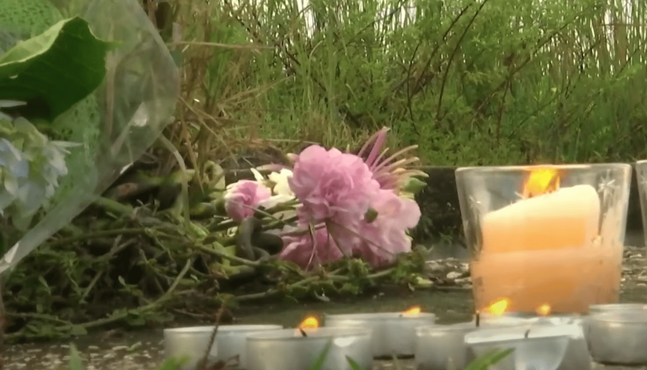 Candles and flowers for Langston Rodriguez-Sane and Gavin Christman. | Source: youtube.com/WKMG News 6 ClickOrlando