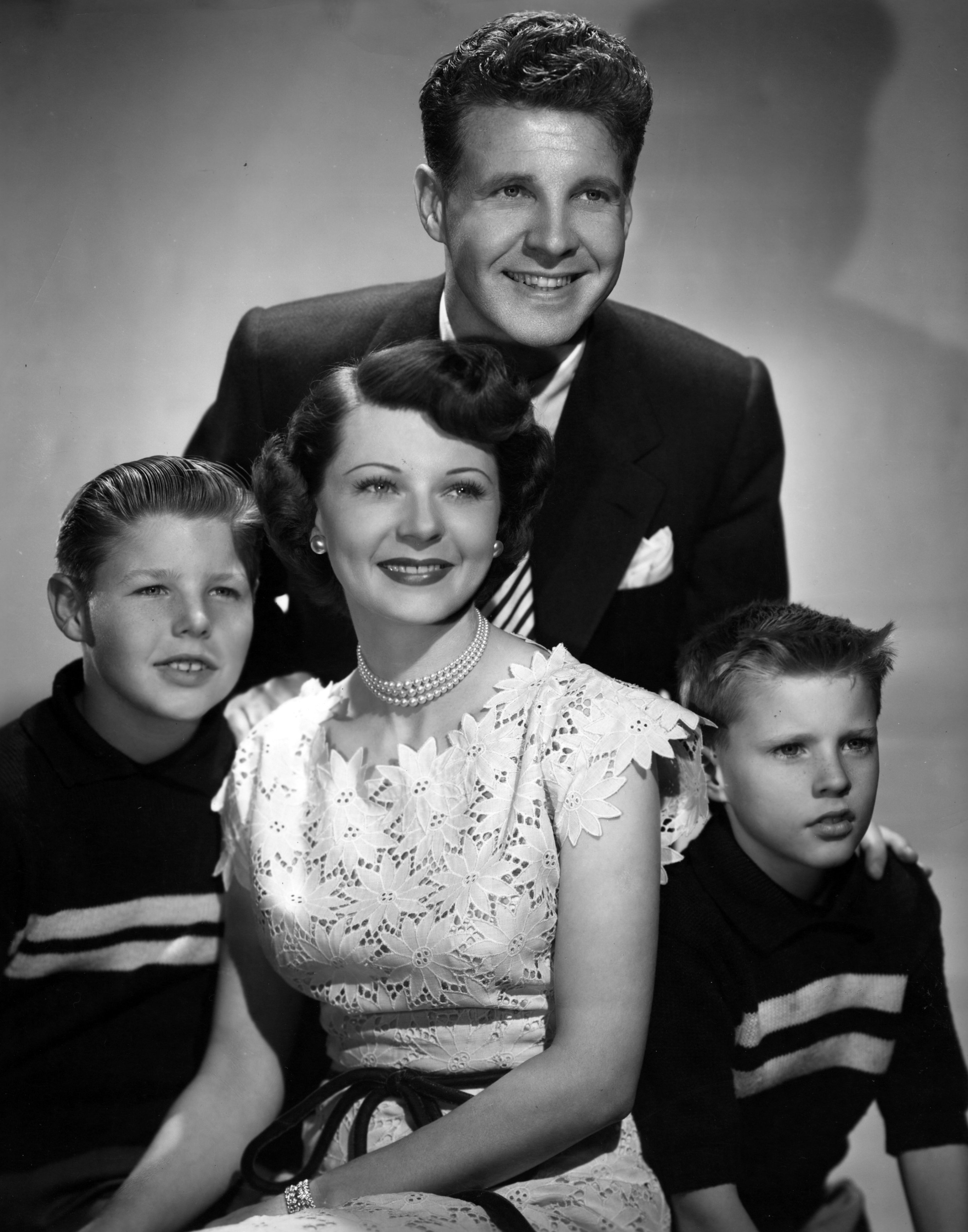 Ozzie and Harriet Nelson with their sons David (left) and Ricky (right) pose for a family portrait in 1946. | Photo: Getty Images