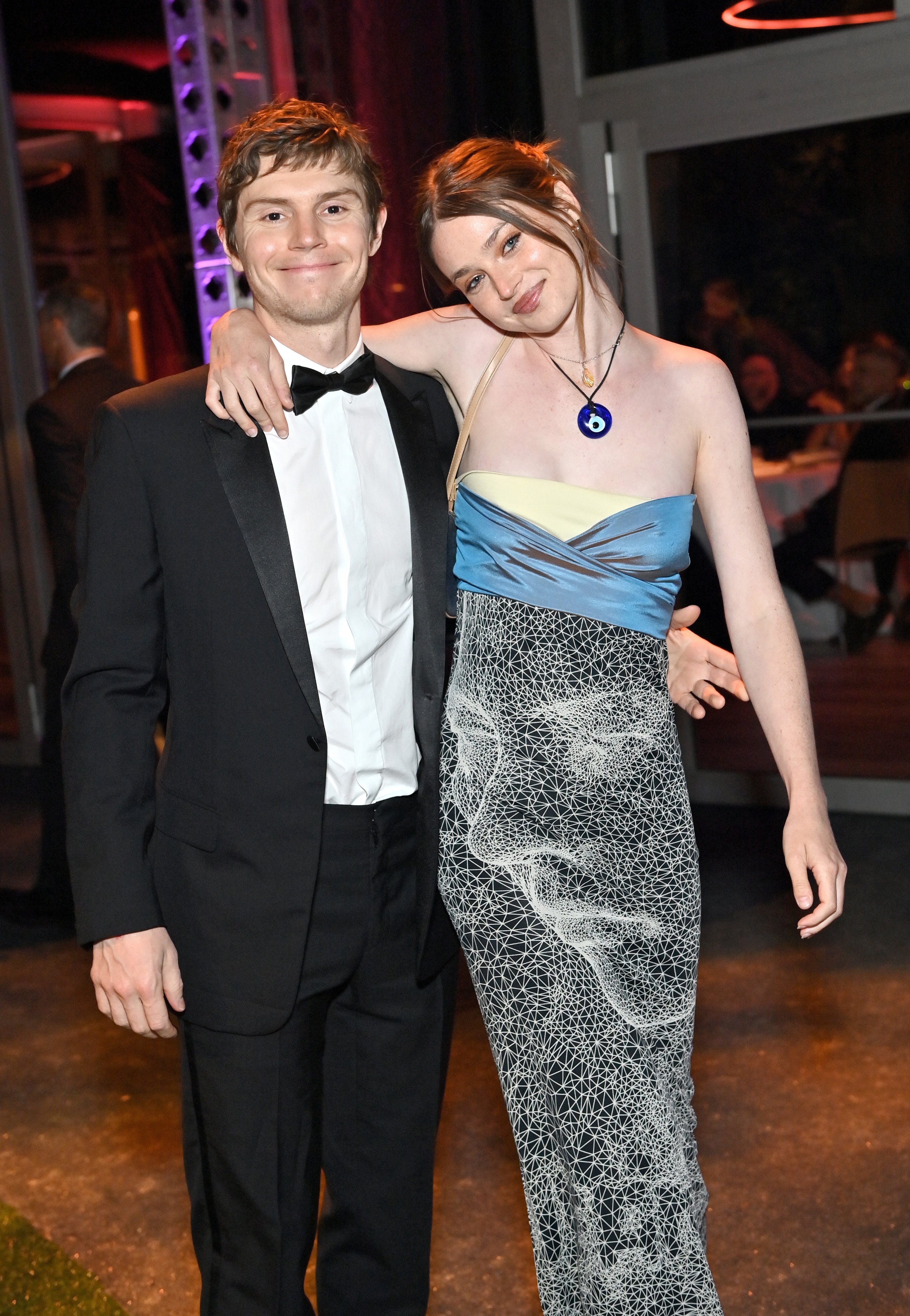 Evan Peters (L) and guest attend the 2022 Vanity Fair Oscar Party hosted by Radhika Jones on March 27, 2022 in Beverly Hills, California. | Source: Getty Images