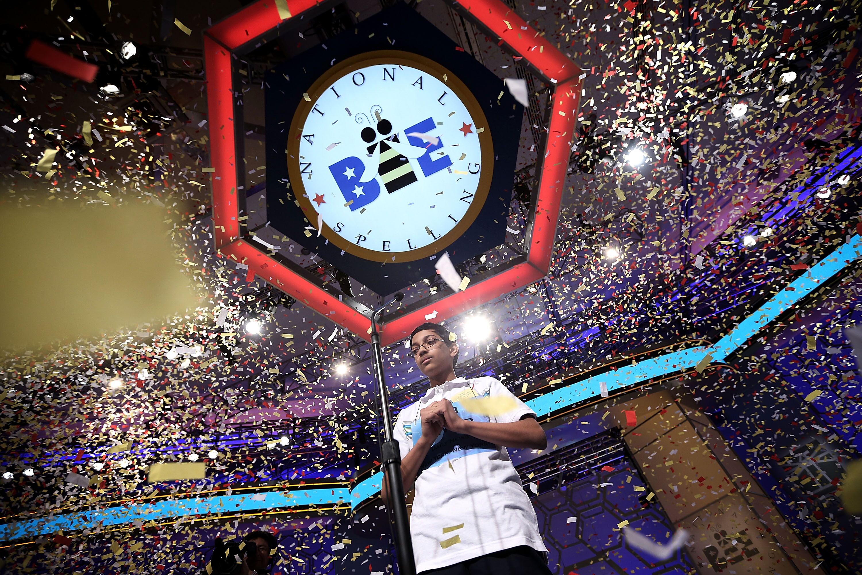Confetti falls over Arvind Mahankali of Bayside Hills, New York after the finals of the 2013 Scripps National Spelling Bee May 30, 2013 at Gaylord National Resort, Maryland | Photo: Getty Images 
