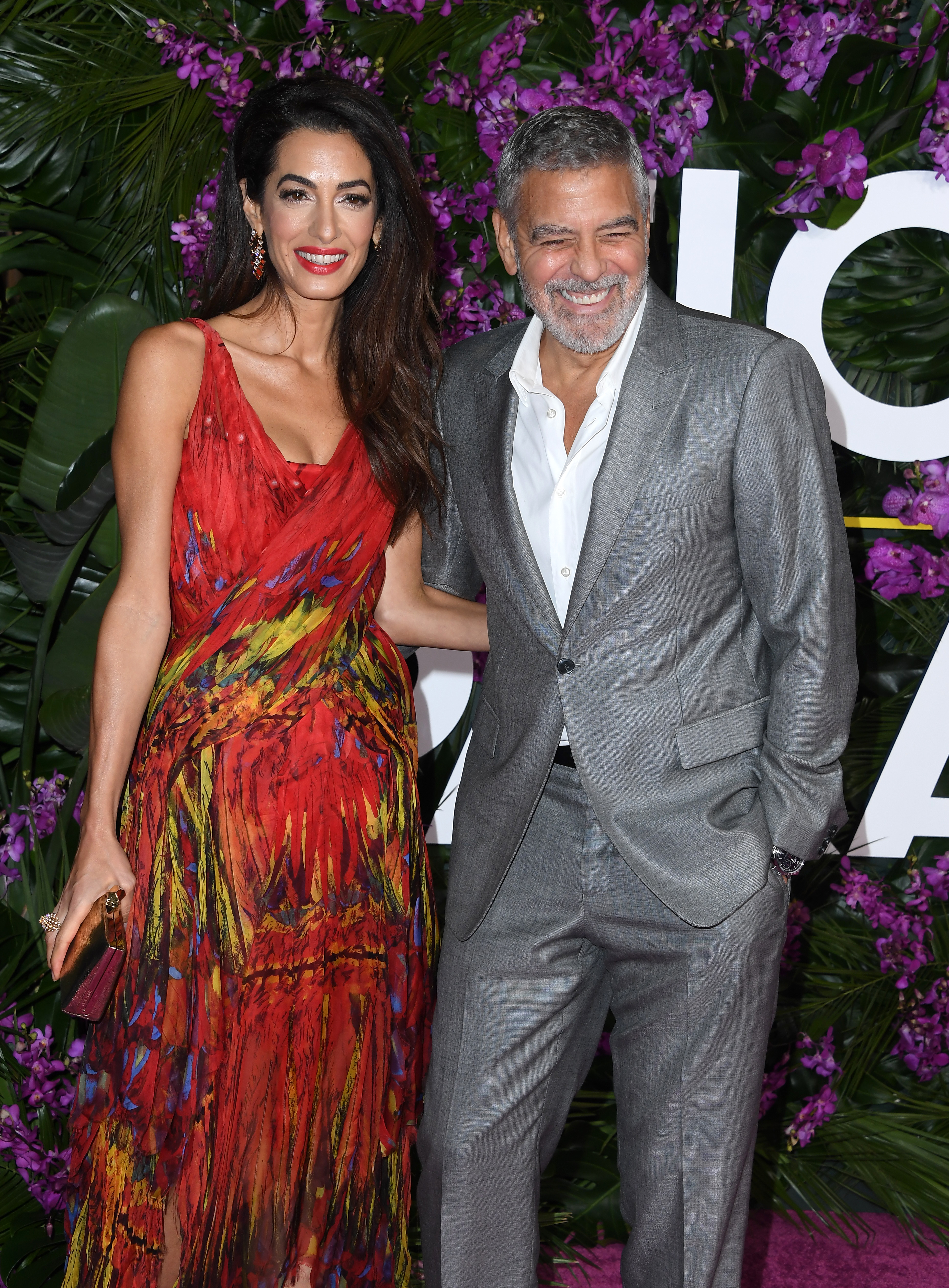 Amal Clooney and George Clooney arriving at the premiere of Universal Pictures' "Ticket To Paradise" on October 17, 2022, in Los Angeles, California | Source: Getty Images