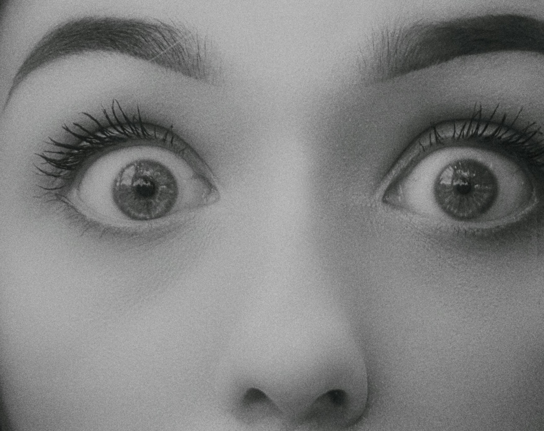 Grayscale close-up of a furious woman's eyes | Source: Pexels