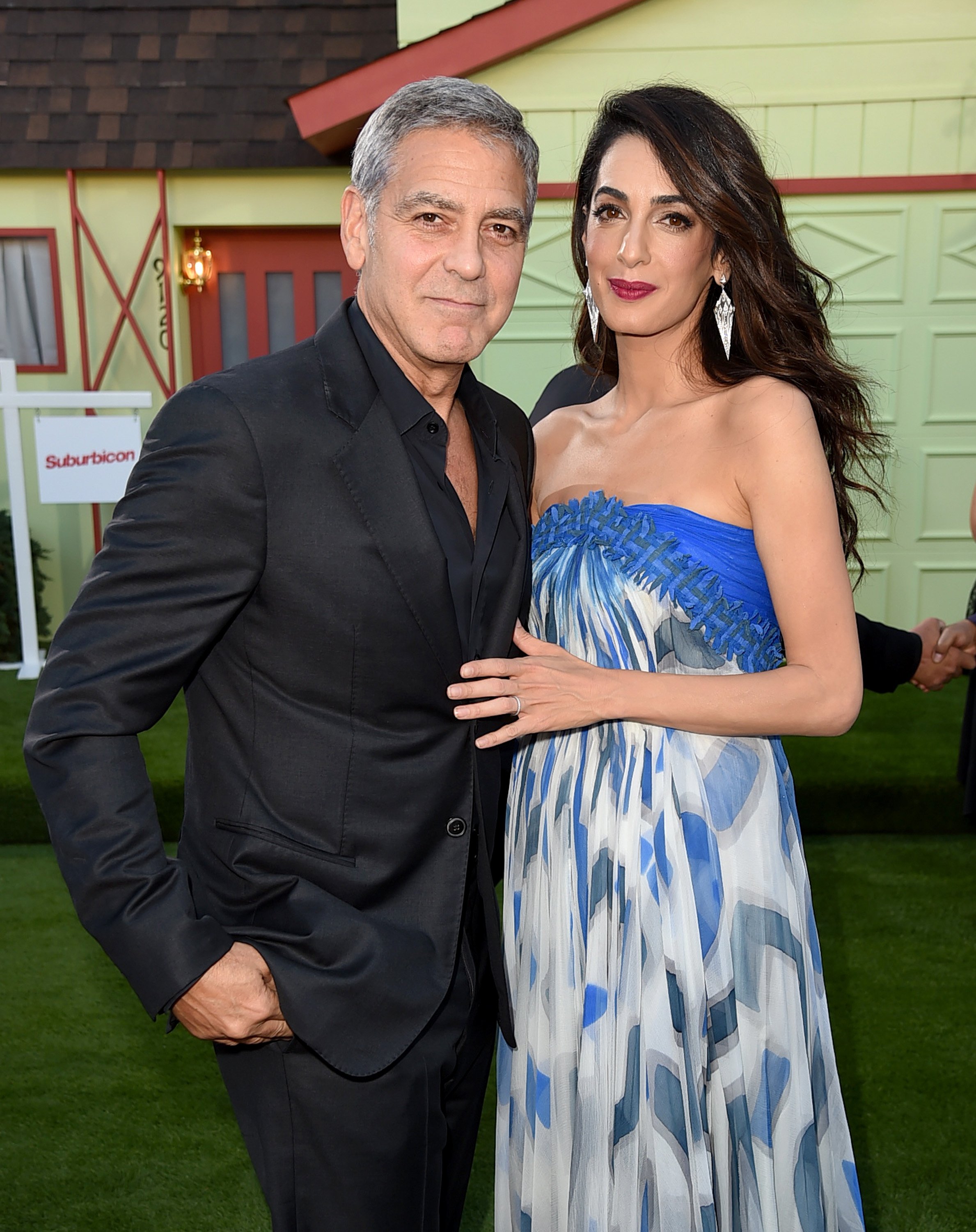 George Clooney and his wife Amal Clooney arrive at the premiere of Paramount Pictures' "Suburbicon" at the Village Theatre on October 22, 2017 in Los Angeles, California | Source: Getty Images