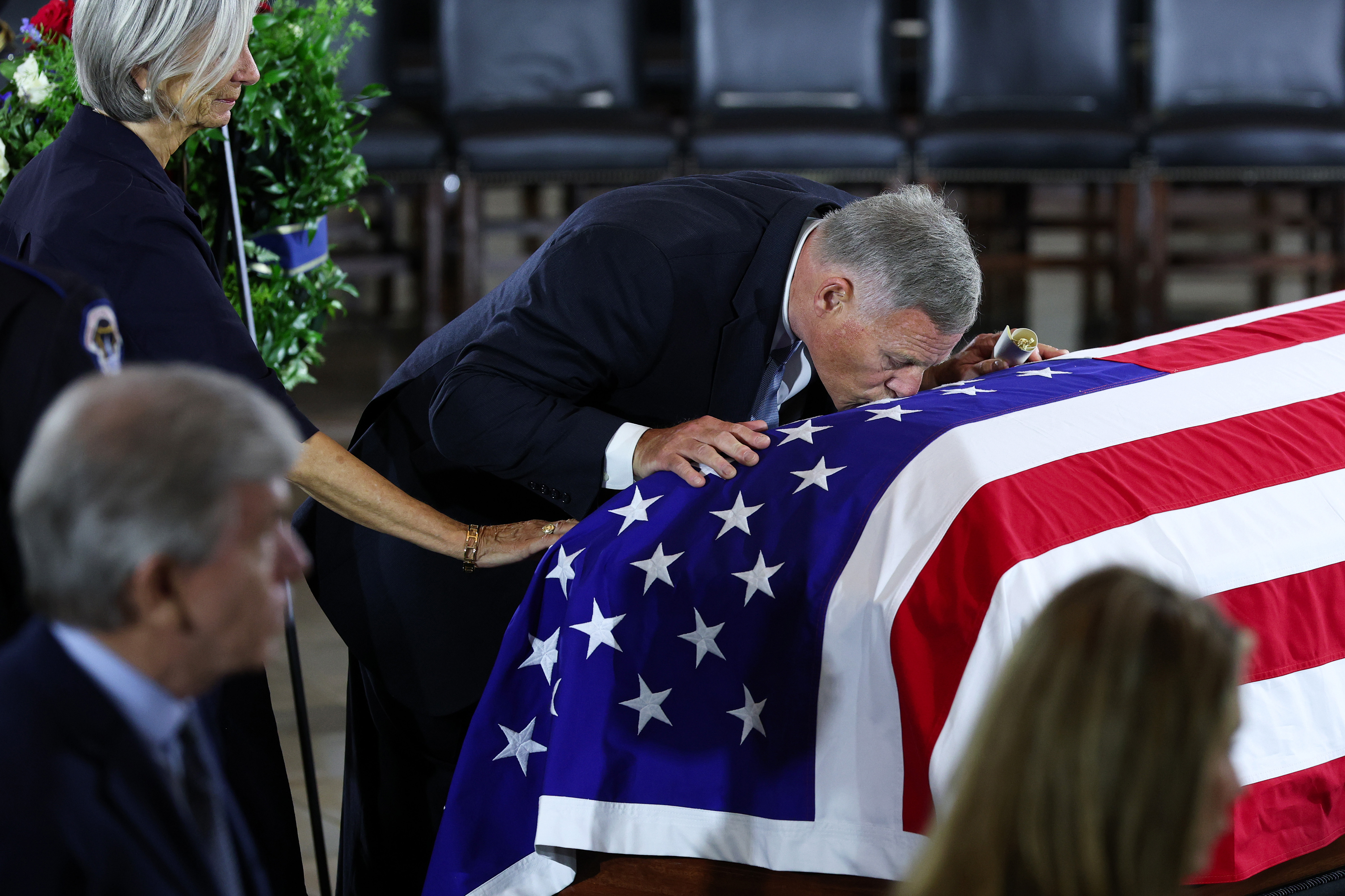 Former U.S. Senator Richard Burr kissed the casket as he paid his respects to his late colleague. In this photo, he stood over the remains as they lay in state during a memorial tribute in the Rotunda of the U.S. Capitol on July 28, 2026, in Washington, D.C. | Source: Getty Images
