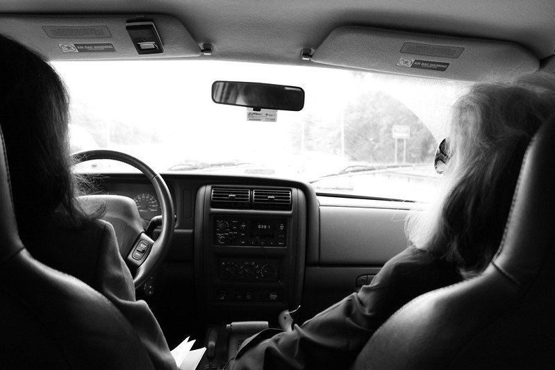 Two women together on a car ride. | Photo: Flickr