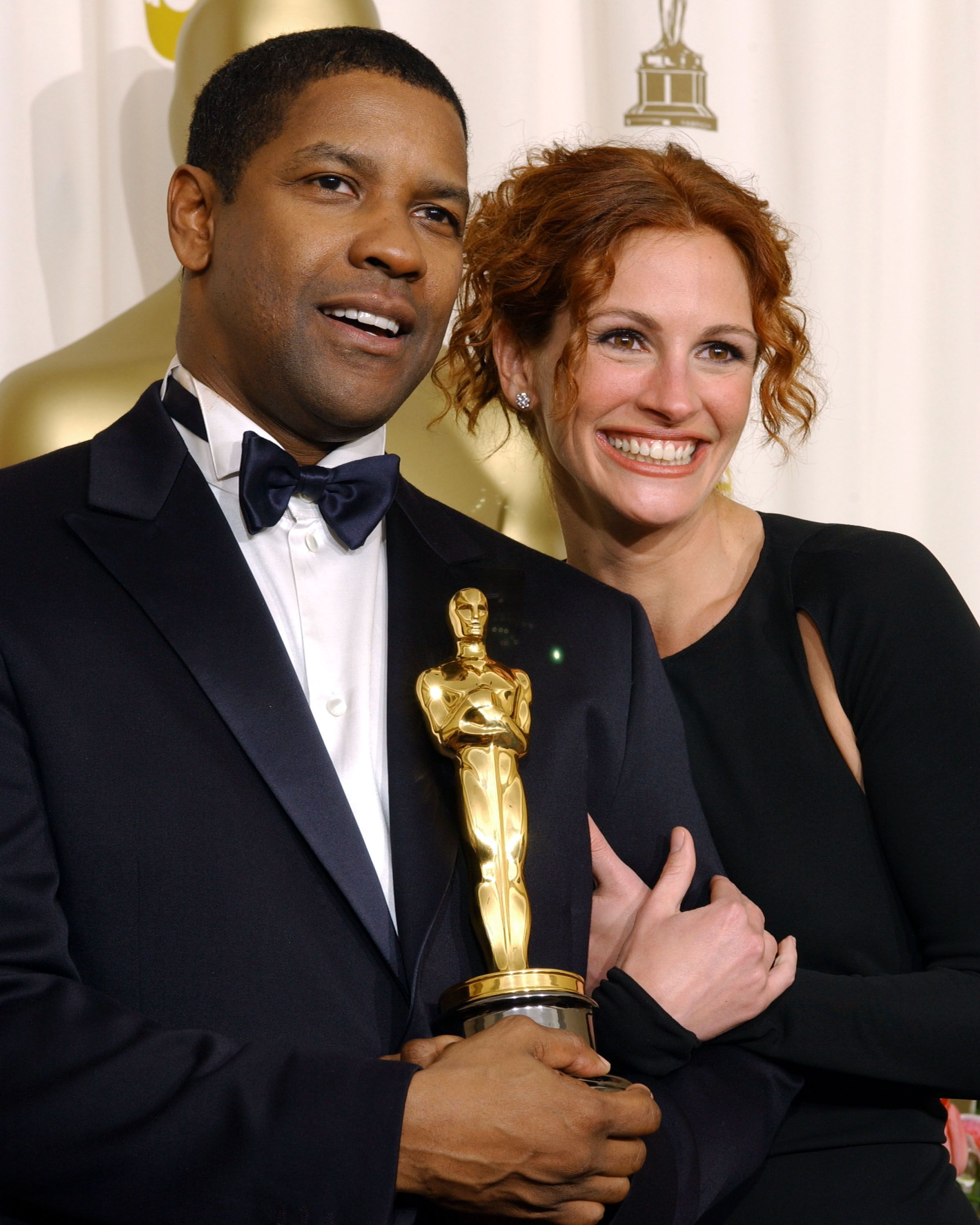 Denzel Washington and Julia Roberts at the 74th Annual Academy Awards in 2002 | Source: Getty Images