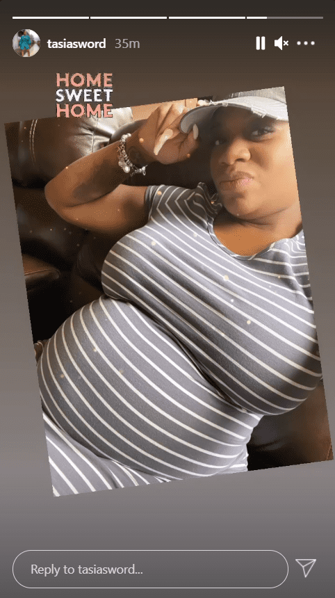Fantasia Barrino shows off her baby bump in a striped dress in her Instagram stories | Source: Instagram.com/tasiasword