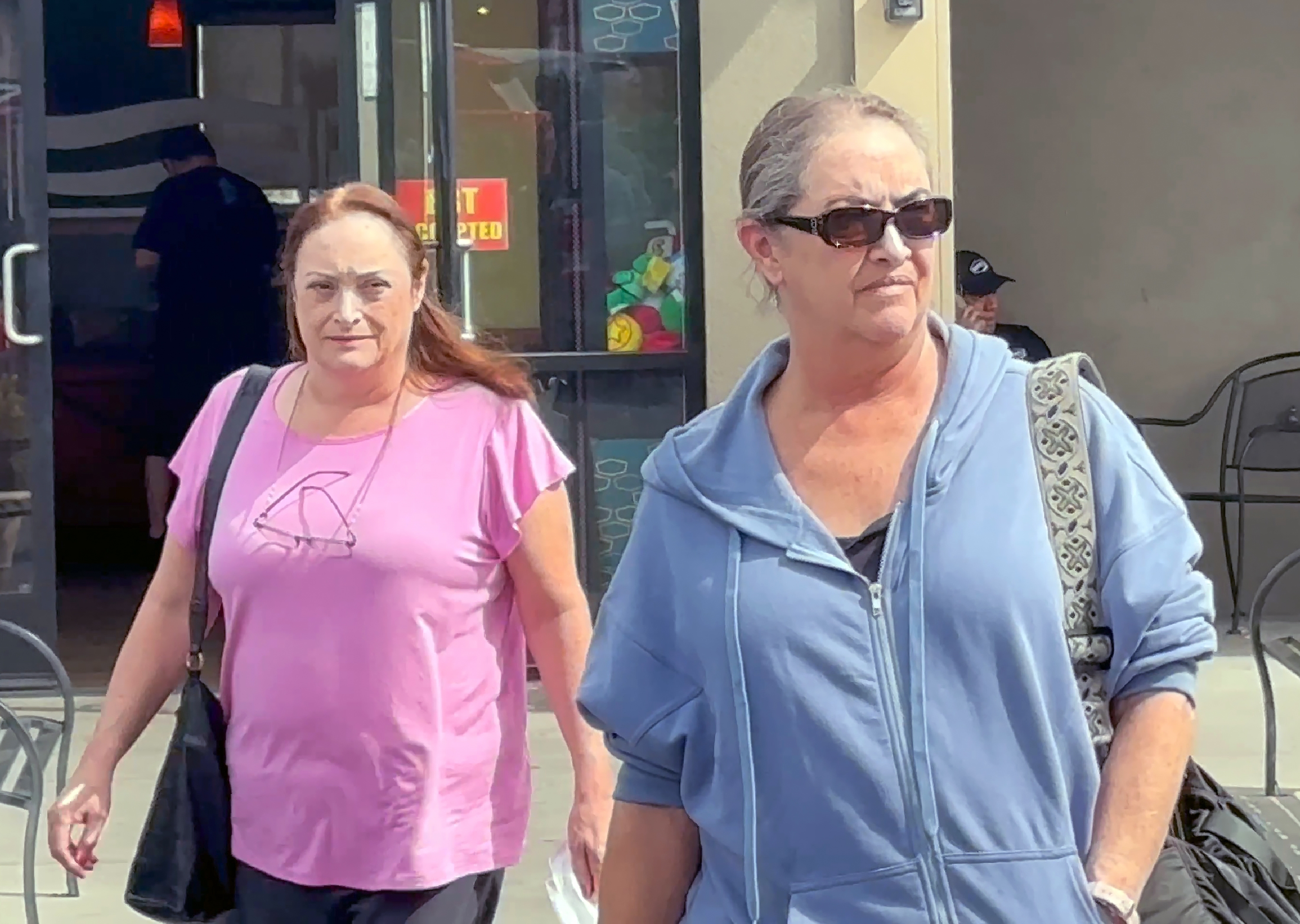 Leslie Hackman and Elizabeth Hackman pictured leaving Denny's on February 27, 2025. in Burbank, California. | Source: Getty Images