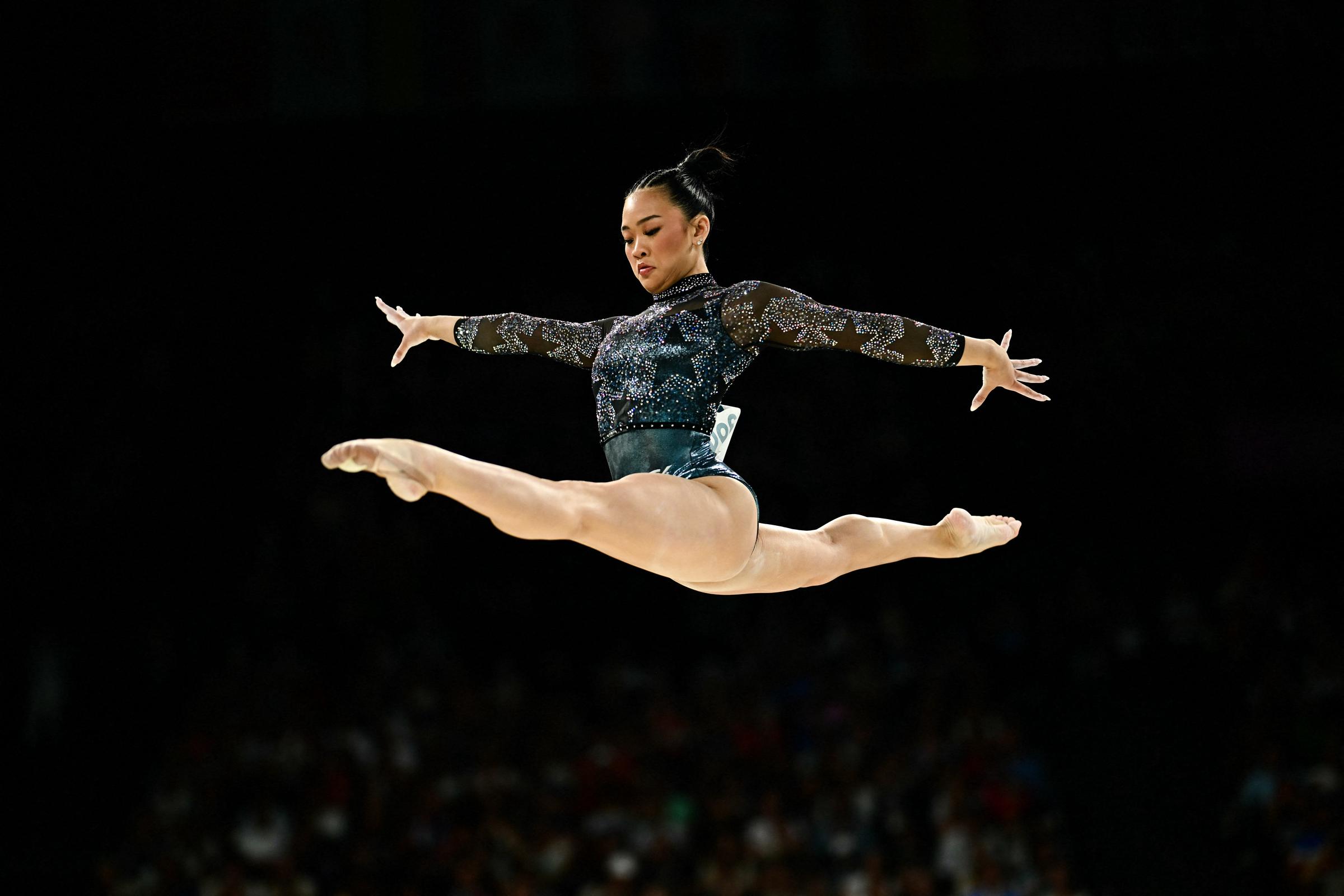 Suni Lee competing in the balance beam event of the artistic gymnastics women's qualification during the Paris 2024 Olympic Games on July 28, 2024, in France. | Source: Getty Images