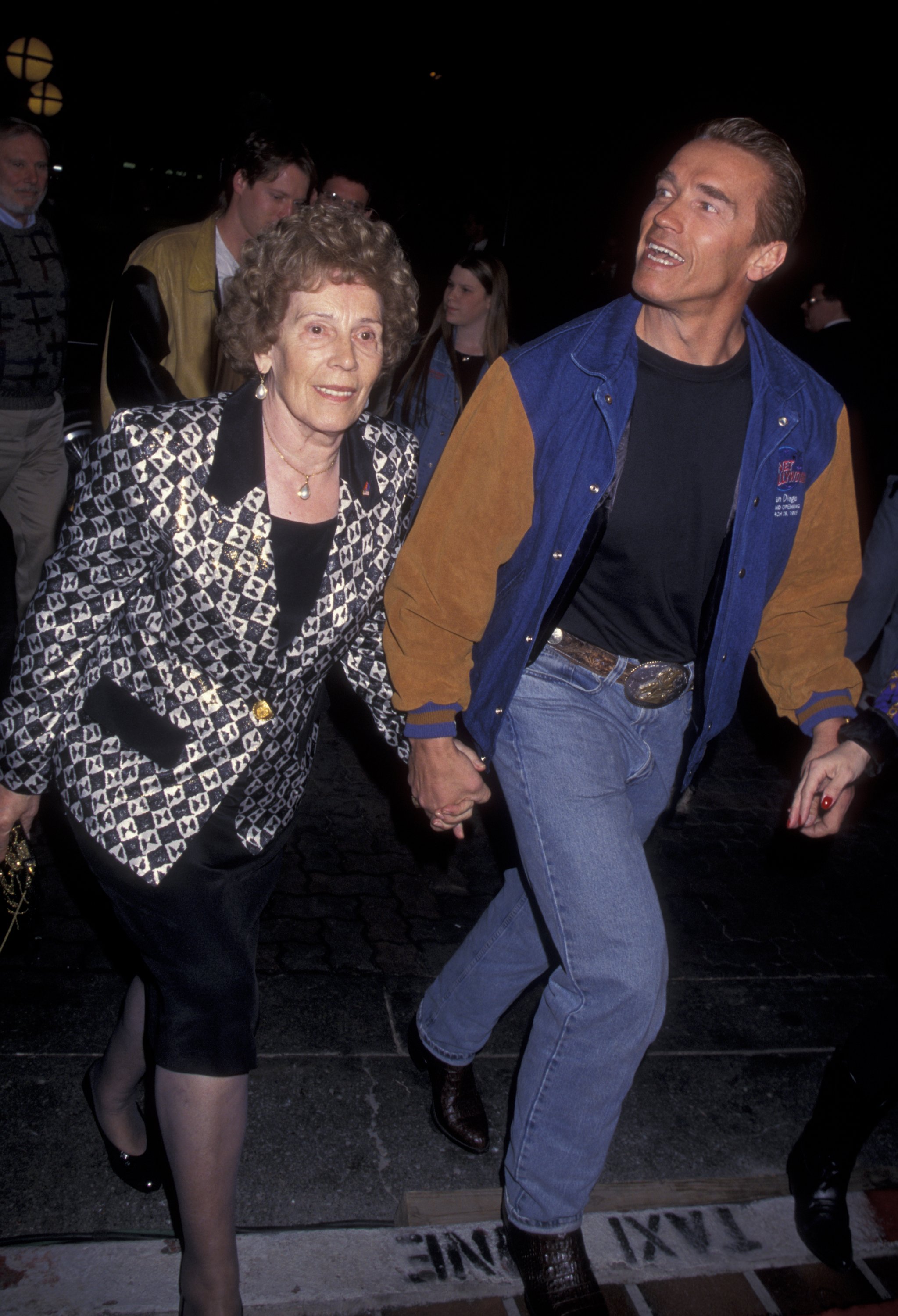 Arnold Schwarzenegger and his mother Aurelia Schwarzenegger at the grand opening of Planet Hollywood on March 25, 1995, in San Diego, California | Source: Getty Images