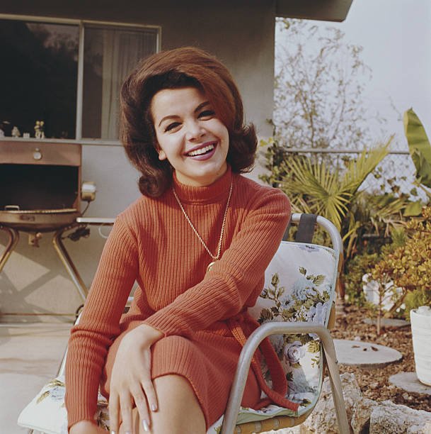Annette Funicello sits outdoors, circa 1965. | Source: Getty Images