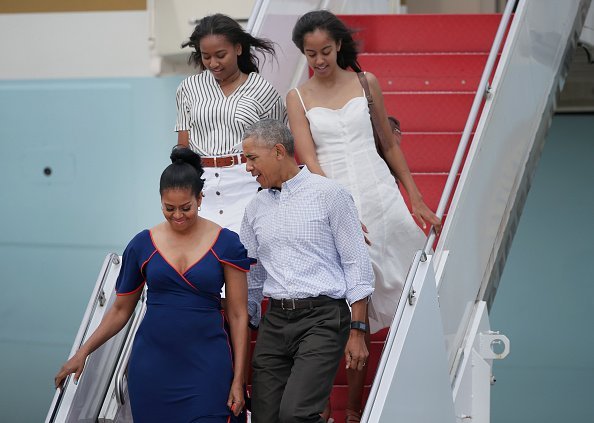 Barack Obama, First Lady Michelle Obama, and their daughters, Sasha and Malia at Joint Base Cape Cod.| Photo: Getty images.