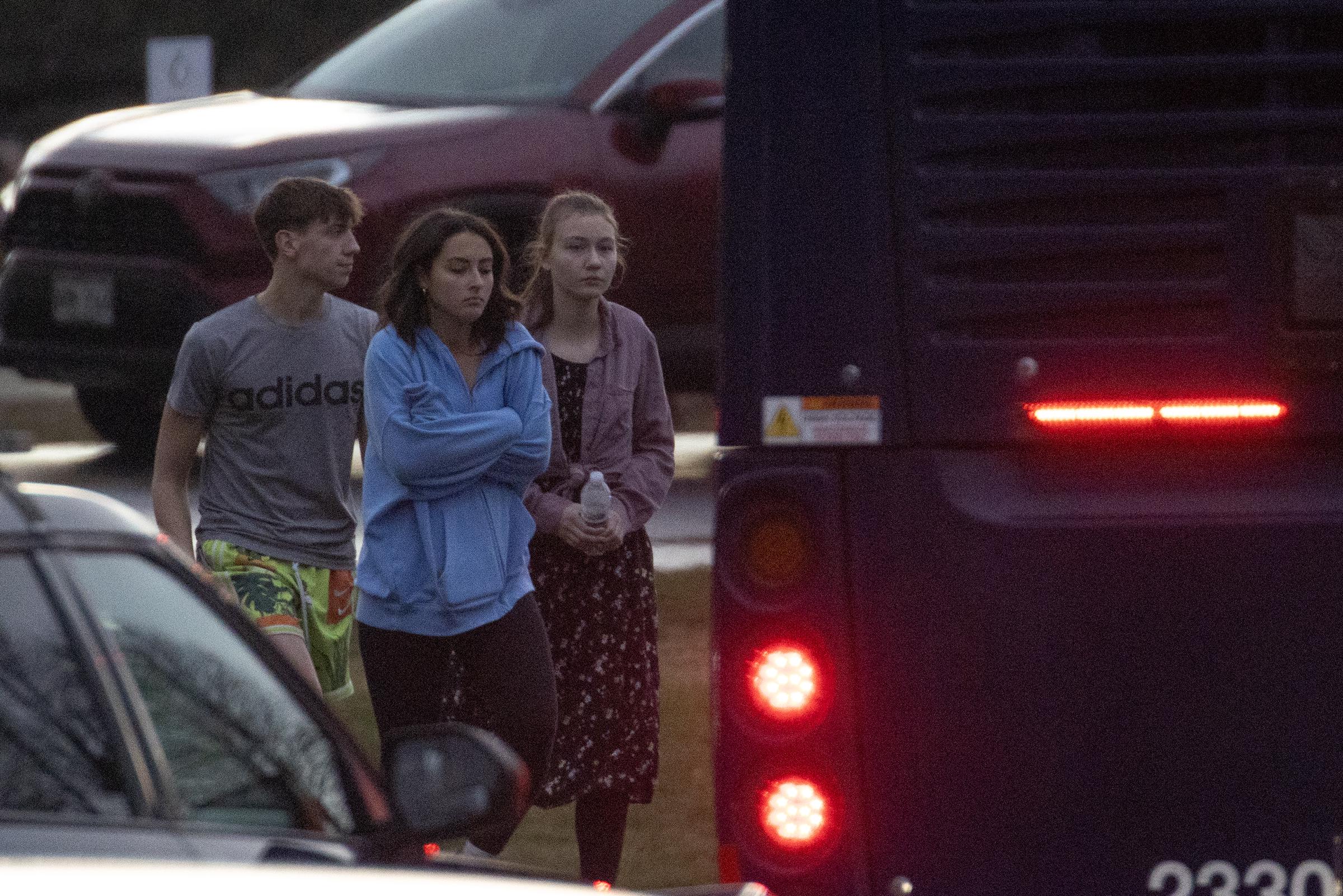 Students escorted from a church on December 16, 2024, in Madison, Wisconsin. | Source: Getty Images