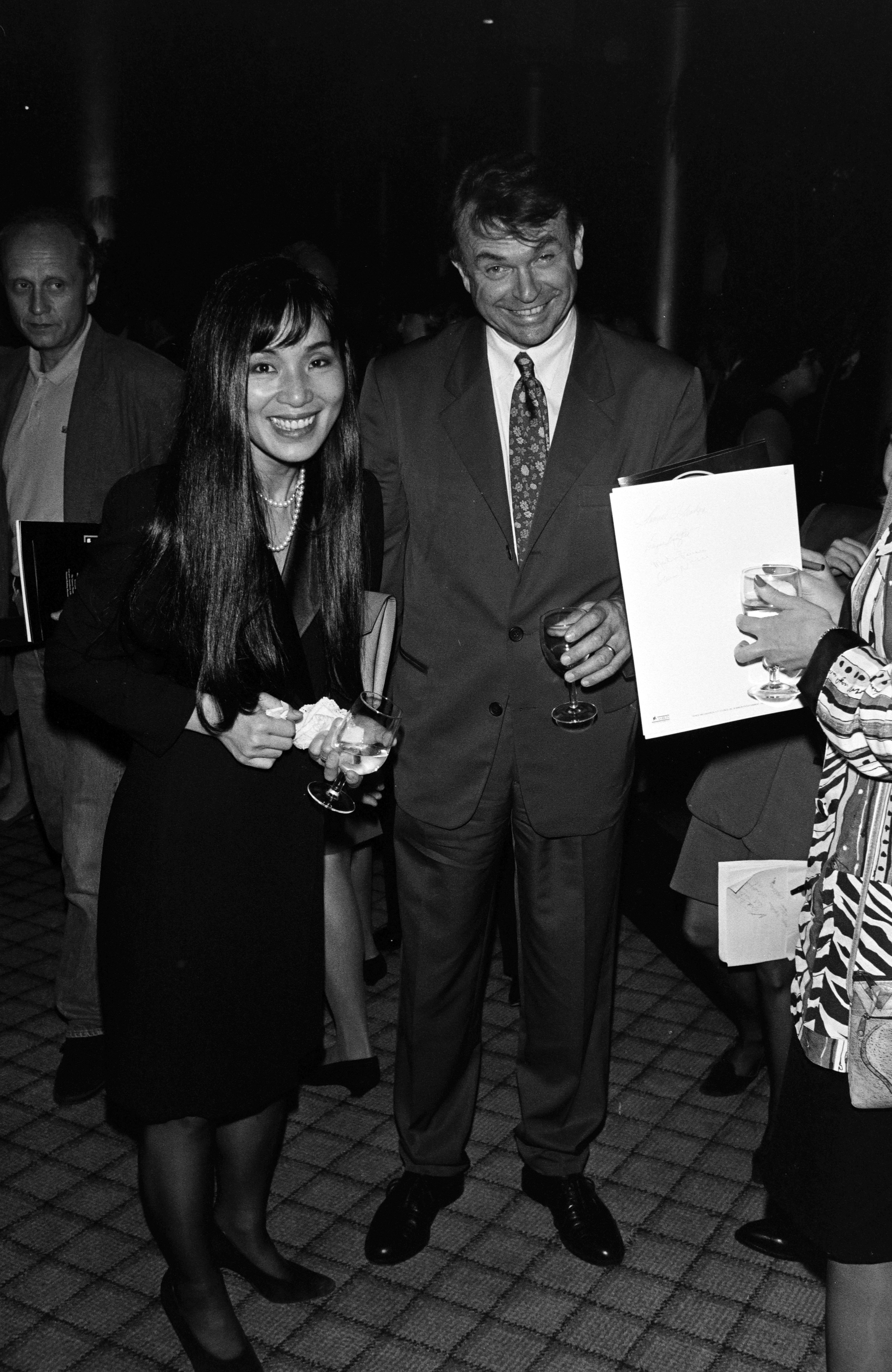 Noriko Watanabe and Sam Neill attend an event at the Uptown Theater on June 9, 1993, in Washington, D.C. | Source: Getty Images