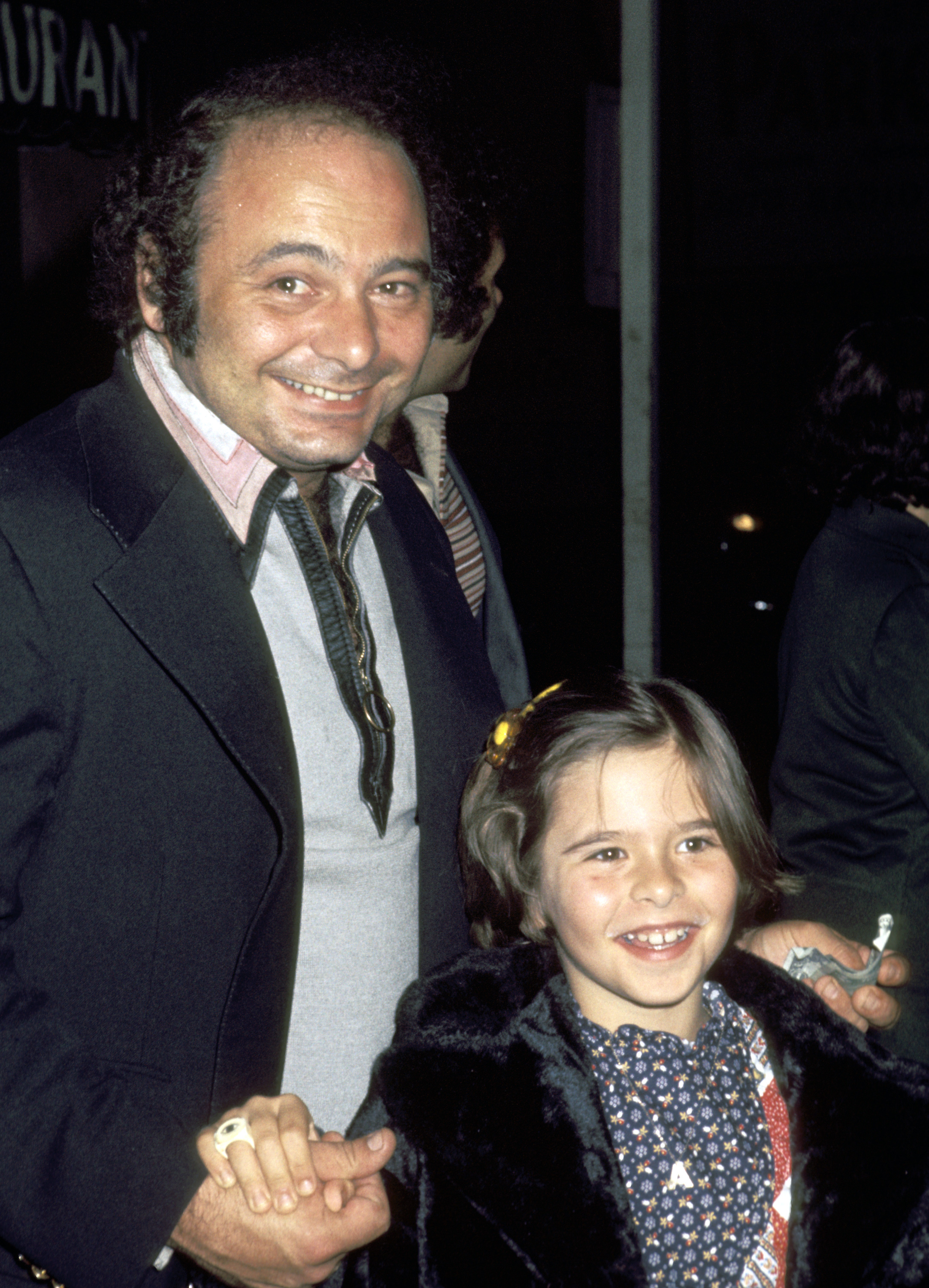Burt Young and Anne Morea Steingeiser are seen at Palm Restaurant on April 27, 1977, in Beverly Hills, California. | Source: Getty Images