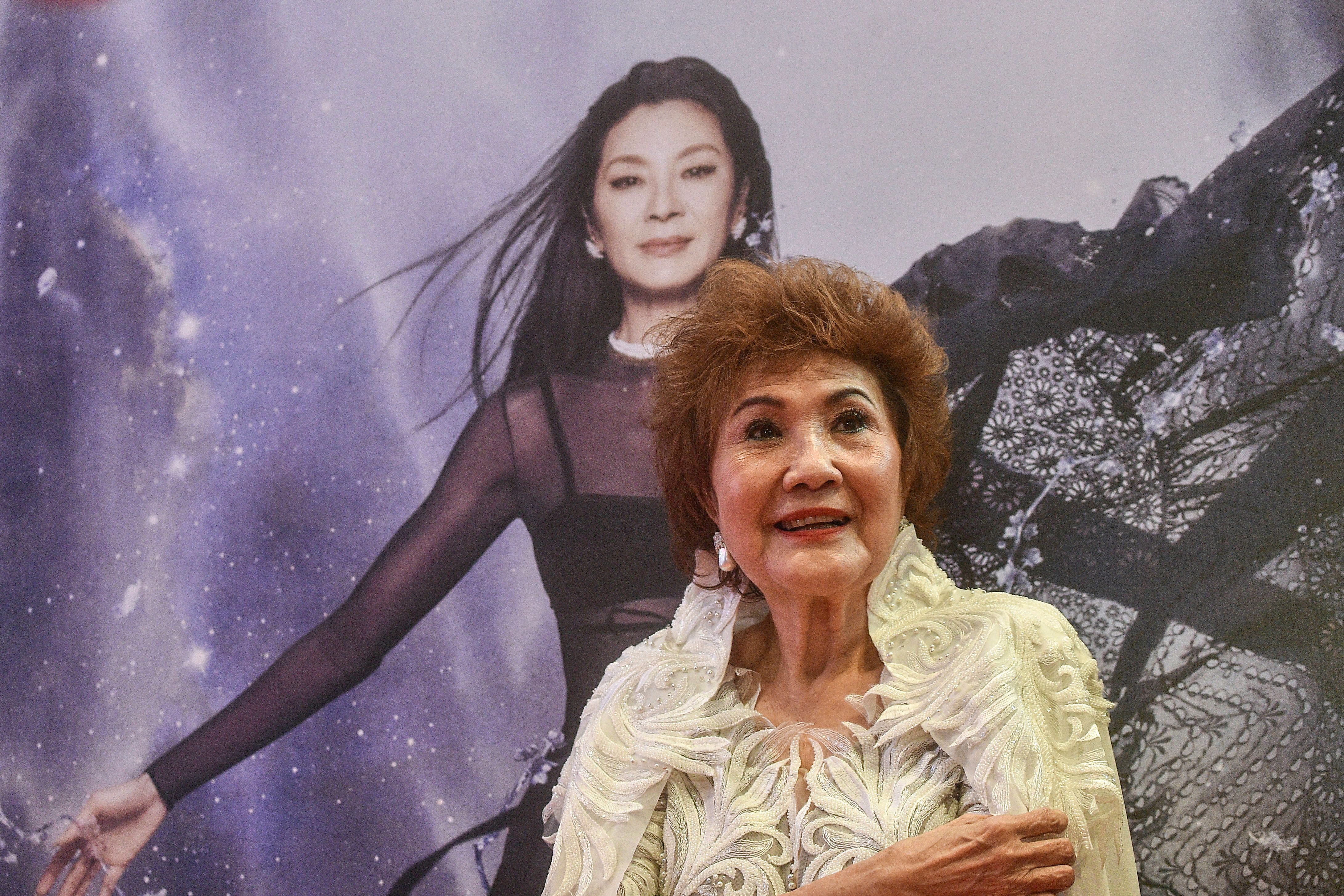 Janet Yeoh, mother of actress Michelle Yeoh, poses for photos after her daughter won the award for Best Actress in a Leading Role at the 95th Academy Awards in Los Angeles, at an event in Kuala Lumpur on March 13, 2023 | Source: Getty Images