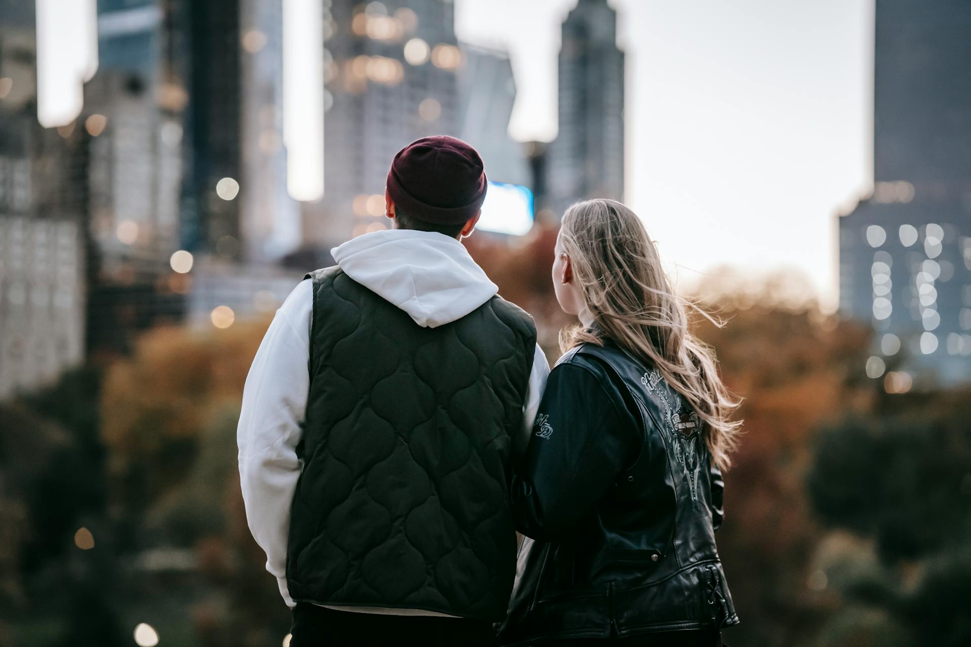 Back view shot of a couple standing outside | Source: Pexels
