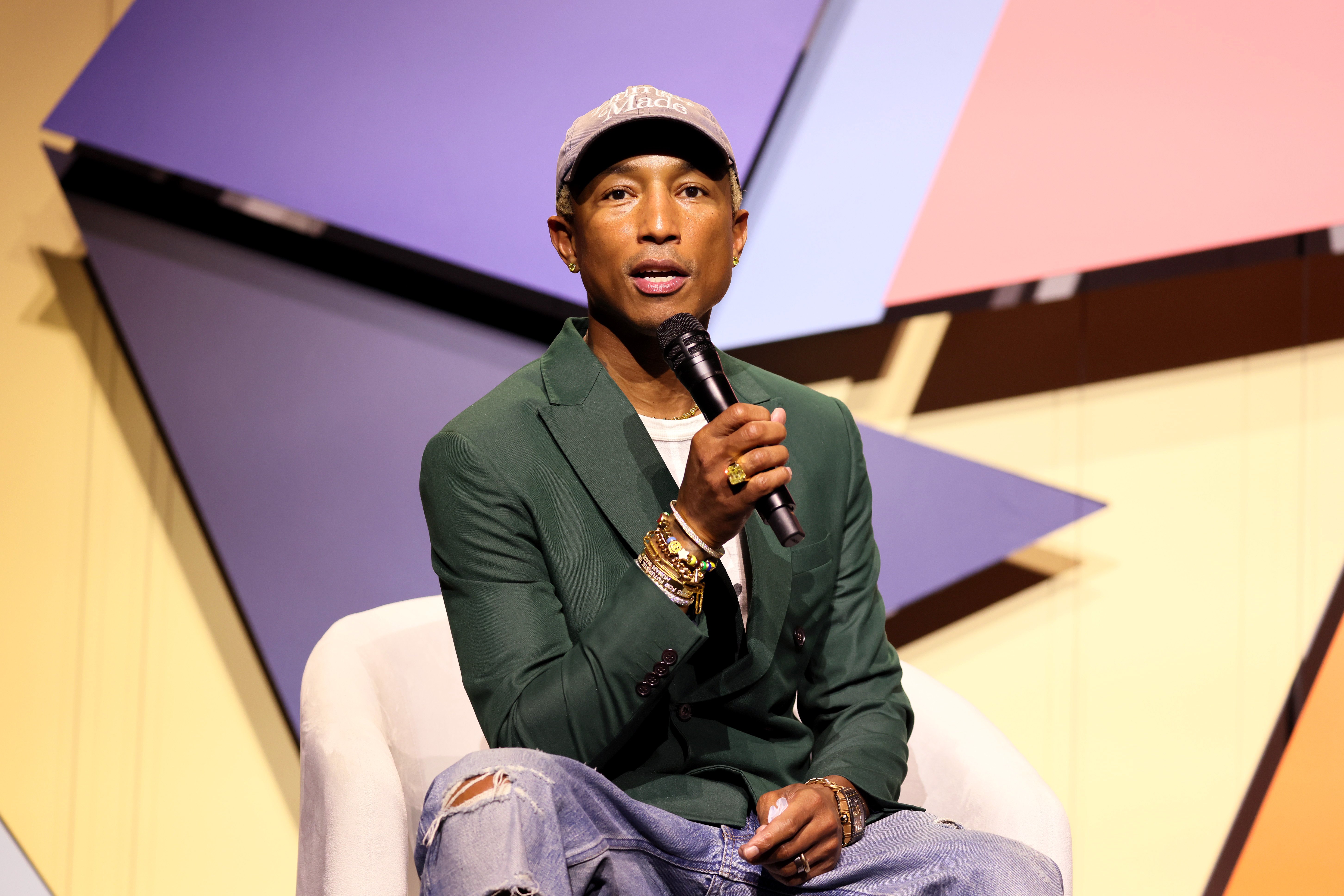 Pharrell Williams speaks onstage during the Mighty Dream Forum on November 01, 2022, in Norfolk, Virginia. | Source: Getty Images